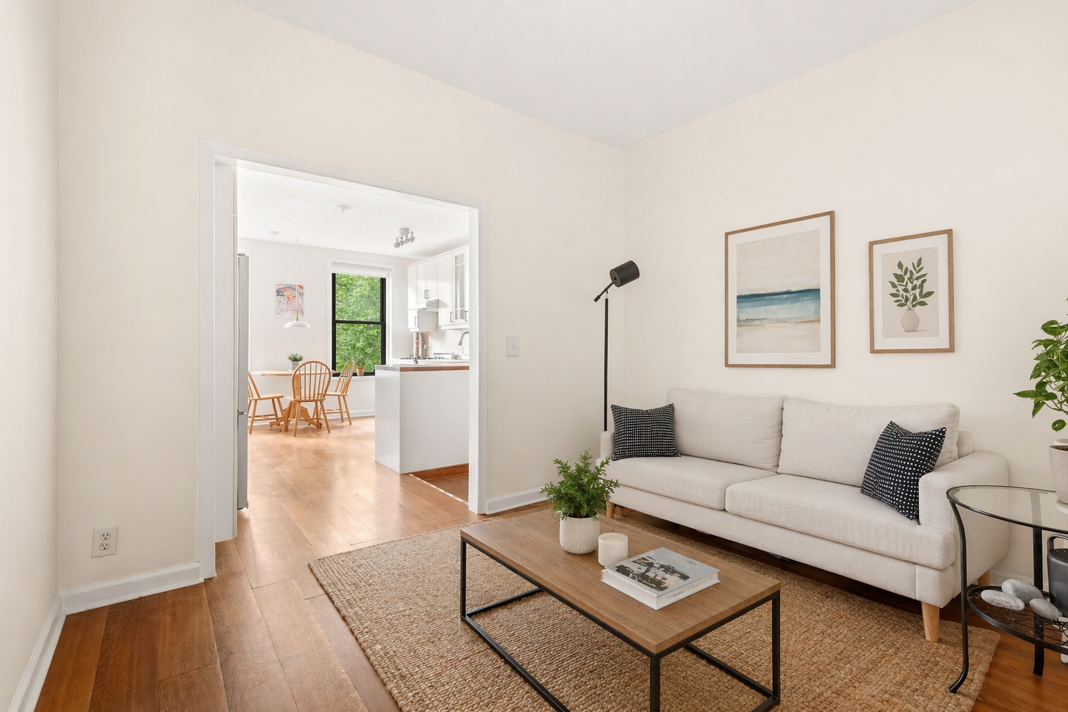 436 East 66th Street, Unit 4E Manhattan, NY 10065 - Photo 4 of 19 a living room with furniture and wooden floor