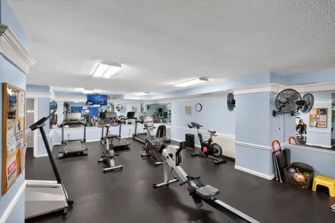 a view of a room with gym equipment