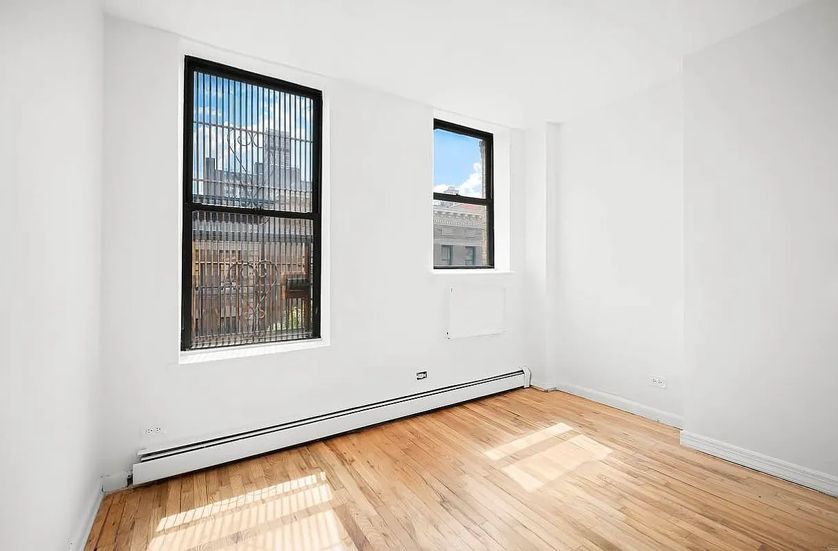 103 West 105th Street, Unit 5A Manhattan, NY 10025 - Photo 10 of 11 an empty room with windows