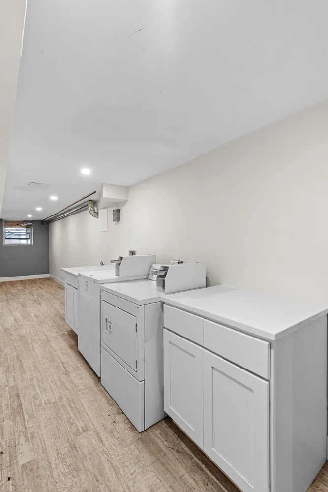 a view with a sink and cabinets