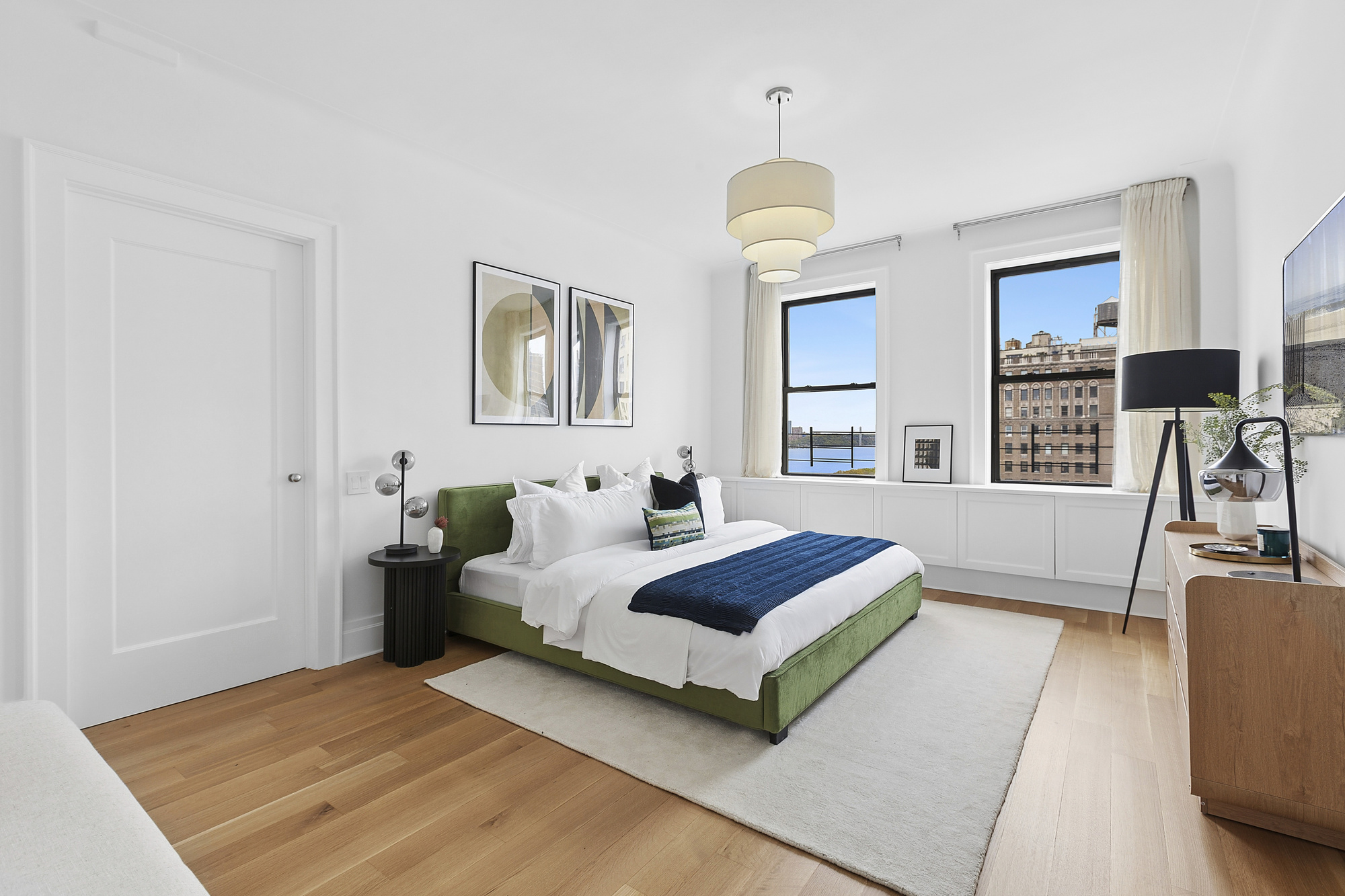 325 Riverside Drive, Unit 111 Manhattan, NY 10025 - Photo 7 of 13 a bedroom with a bed couch and a window