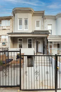 a front view of a house with a porch