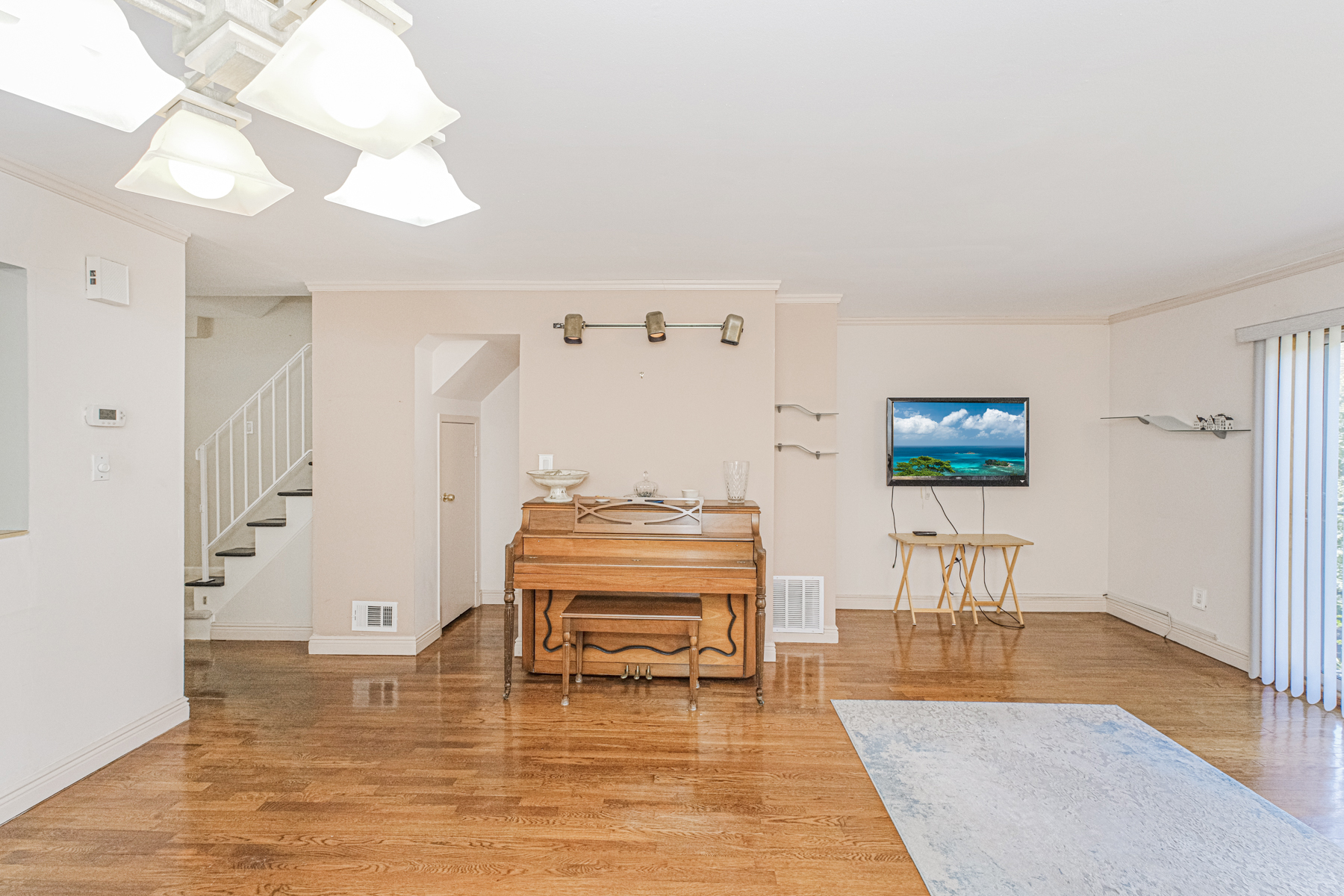 97 Dogwood Lane Staten Island, NY 10305 - Photo 3 of 22 a living room with furniture and a table
