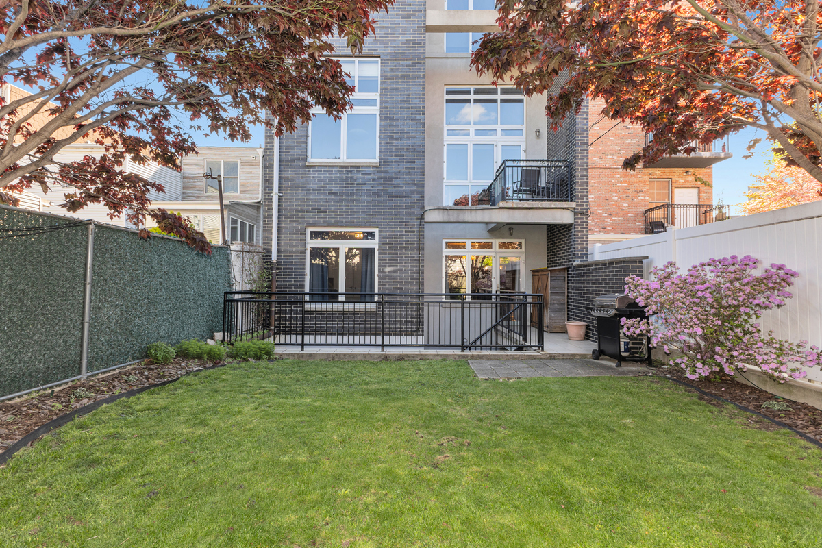 319 Humboldt Street, Unit 1B Brooklyn, NY 11211 - Photo 15 of 17 a house view with a sitting space and garden