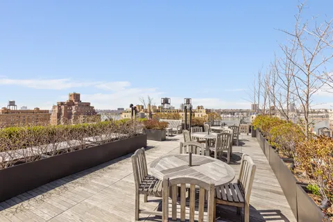 a view of a terrace with furniture