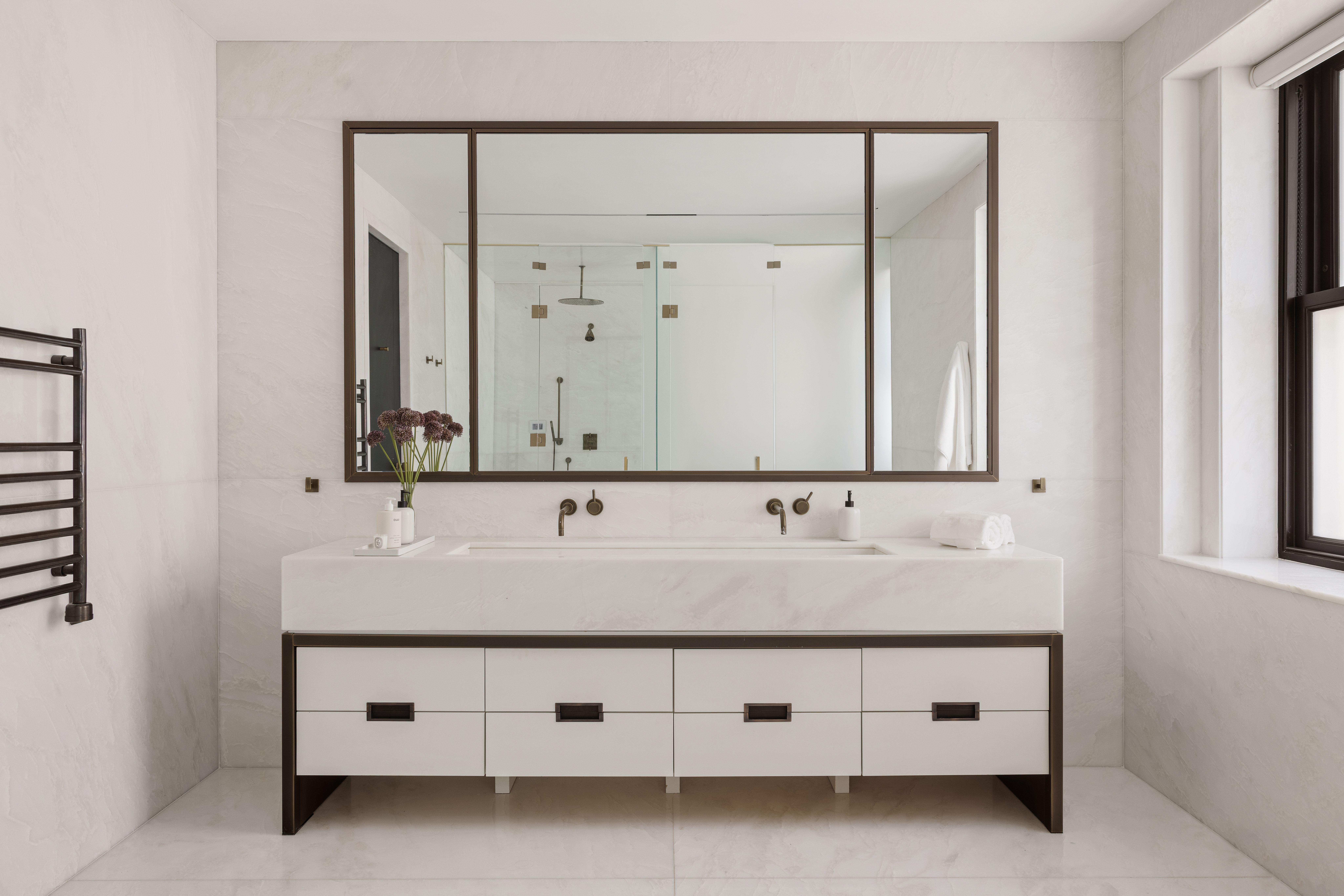 443 Greenwich Street, Unit PHD Manhattan, NY 10013 - Photo 19 of 32 a bathroom with a double vanity sink and mirror