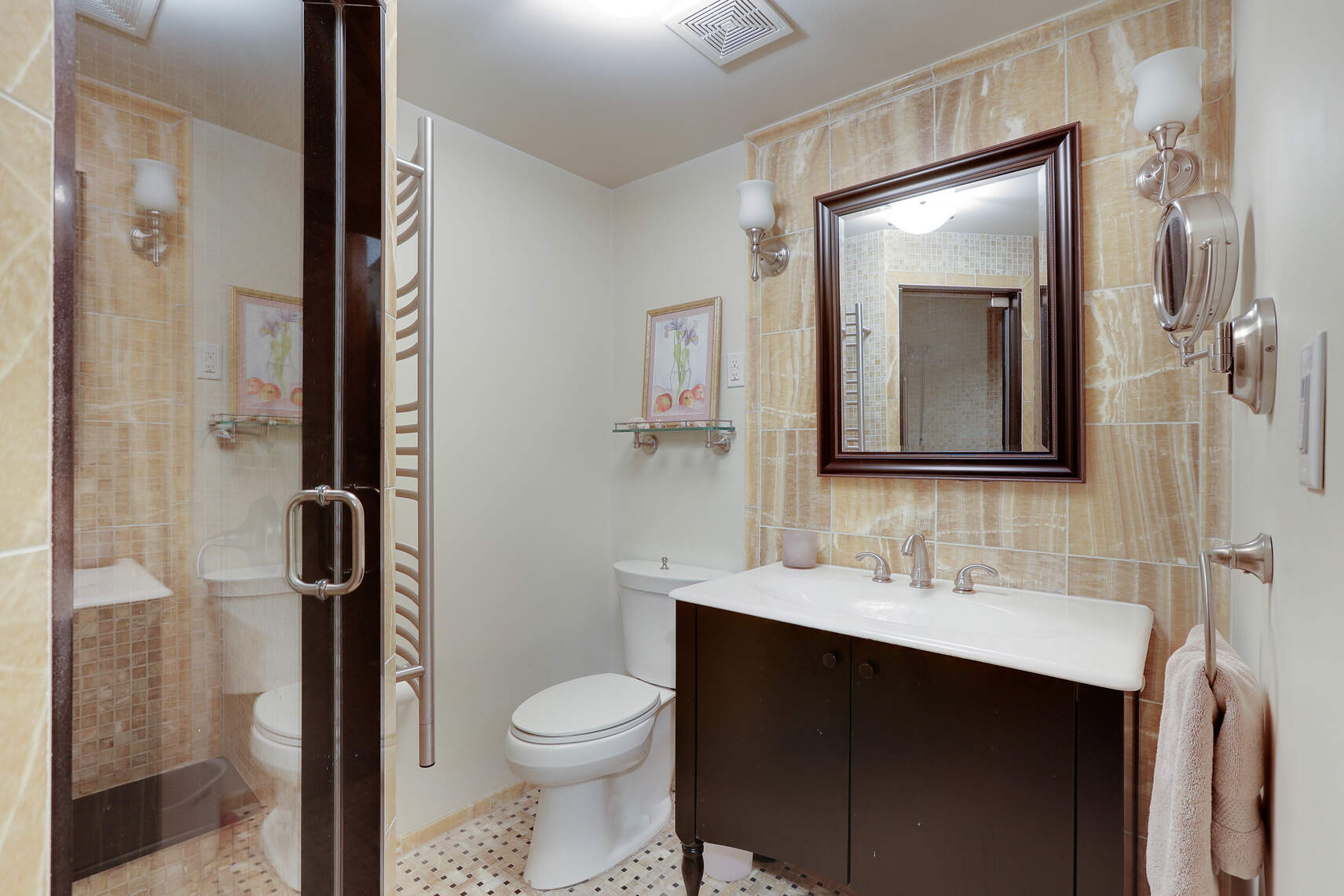 261 Fenimore Street Brooklyn, NY 11225 - Photo 17 of 21 a bathroom with a toilet sink vanity and shower