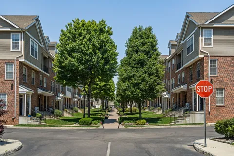 a front view of a building with street view