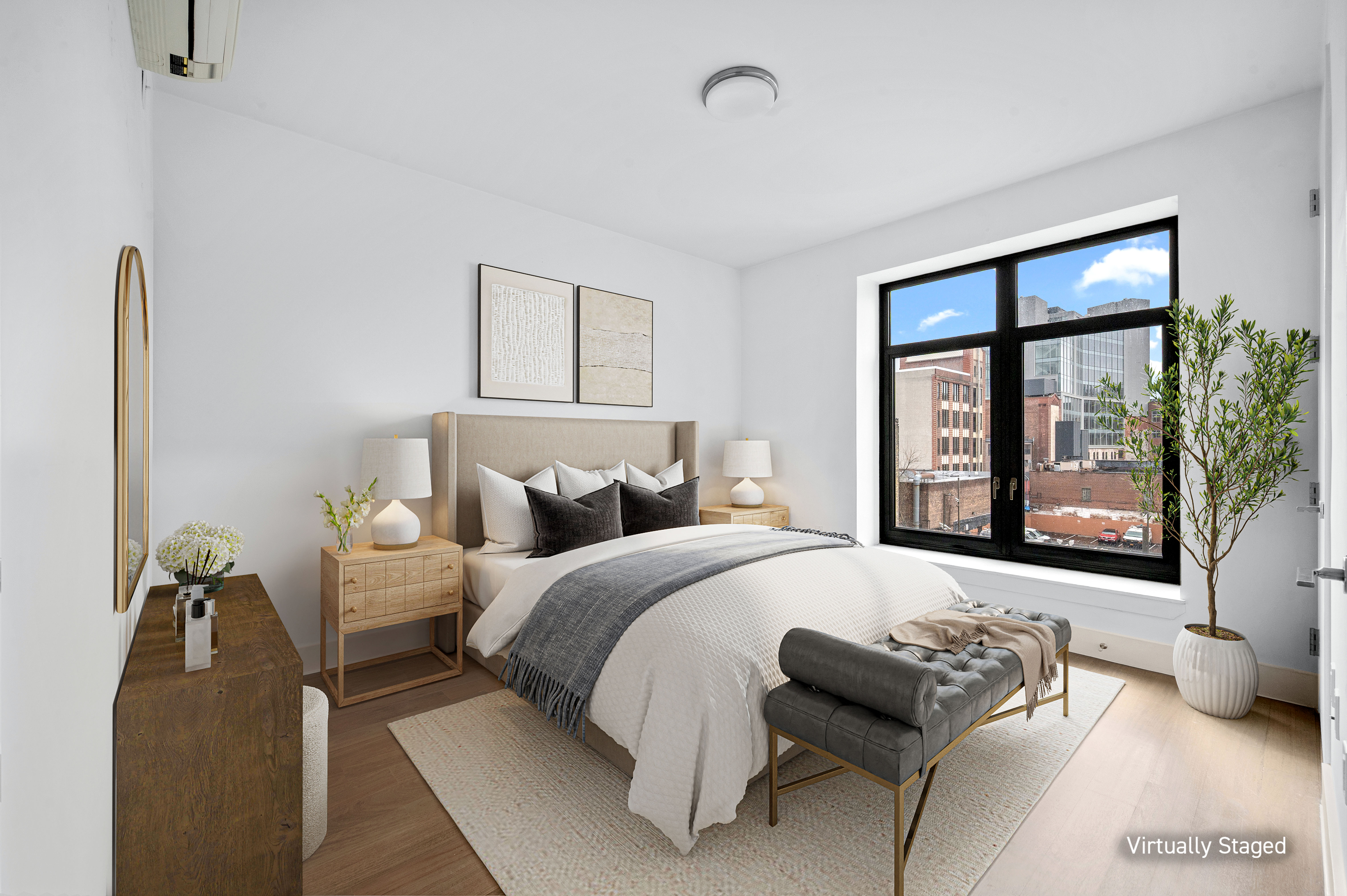 17 Convent Avenue Manhattan, NY 10027 - Photo 8 of 15 a bedroom with a bed and a large window