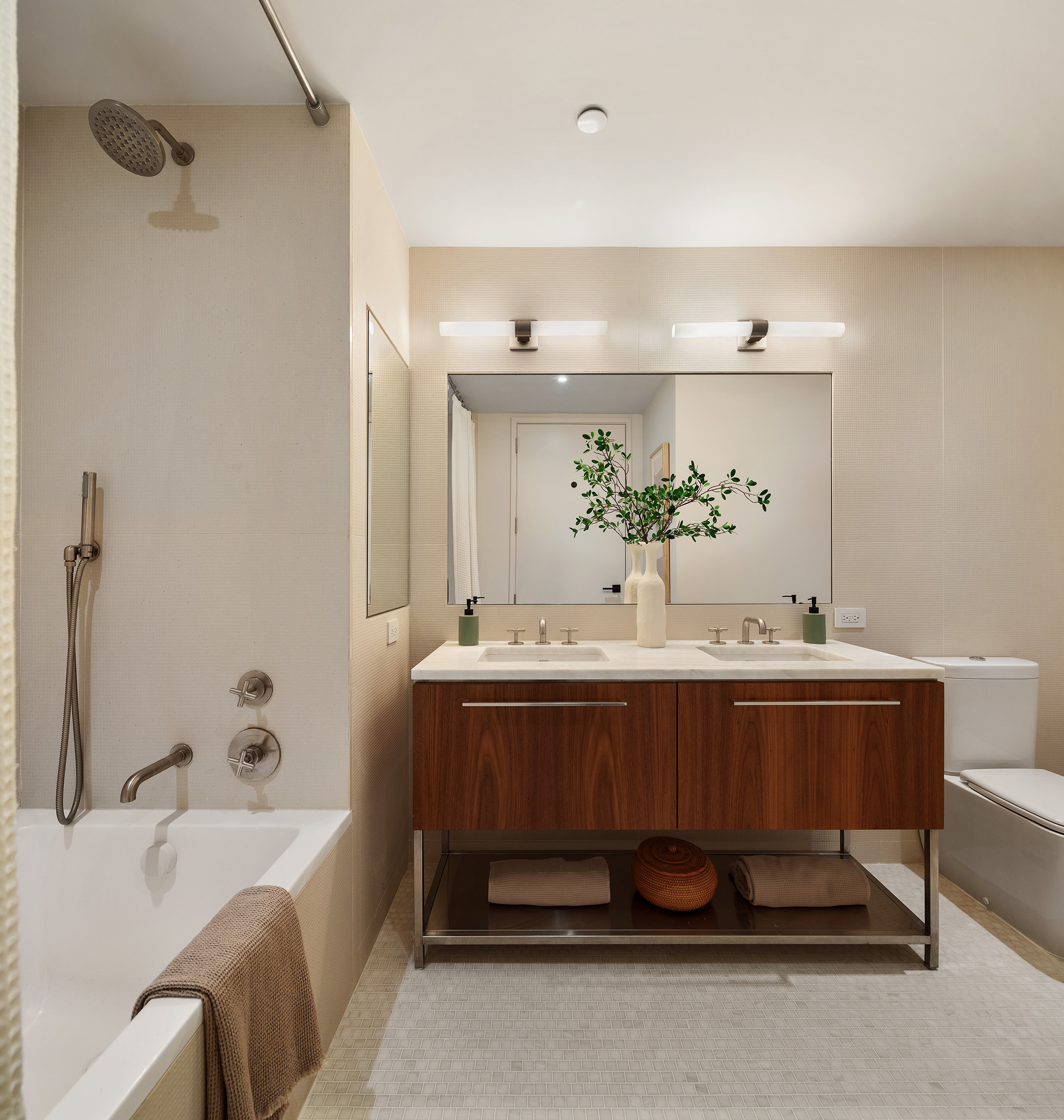 90 Furman Street, Unit N411 Brooklyn, NY 11201 - Photo 18 of 29 a bathroom with a tub sink and mirror