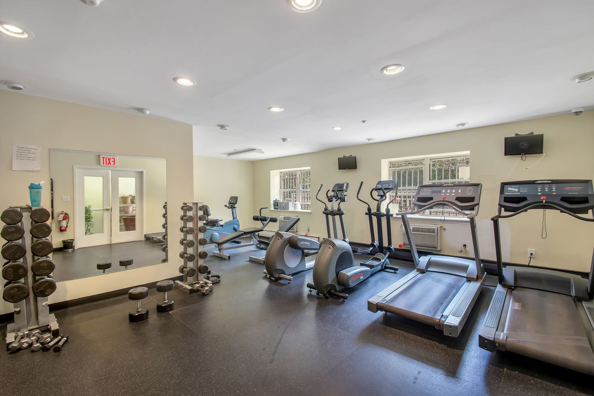 1787 Madison Avenue, Unit 312 Manhattan, NY 10035 - Photo 6 of 8 a view of a room with gym equipment