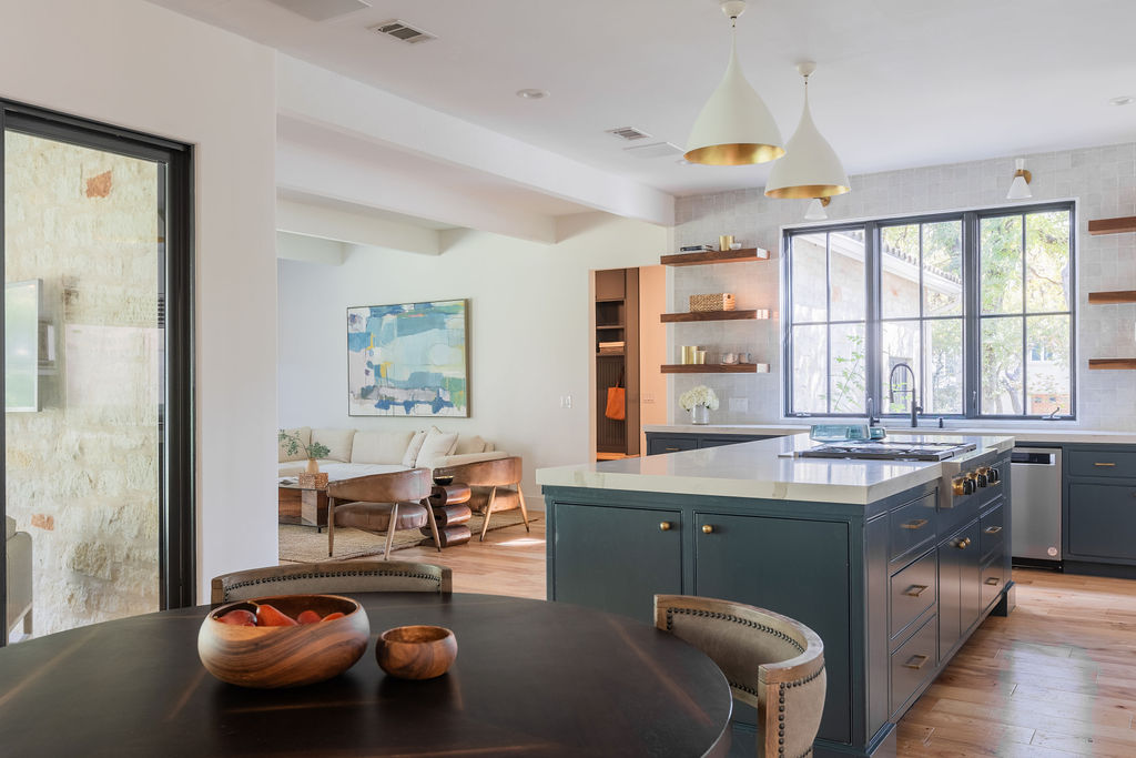 400 Inwood Road Austin, TX 78746 - Photo 11 of 43 a living room with furniture and a large window