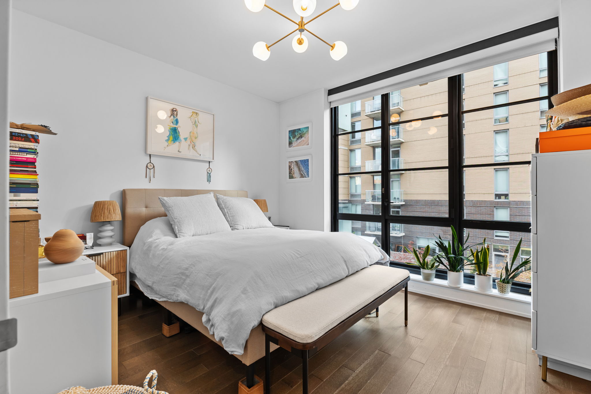261 West 25th Street, Unit 4A Manhattan, NY 10001 - Photo 8 of 16 a bedroom with a bed and a large window
