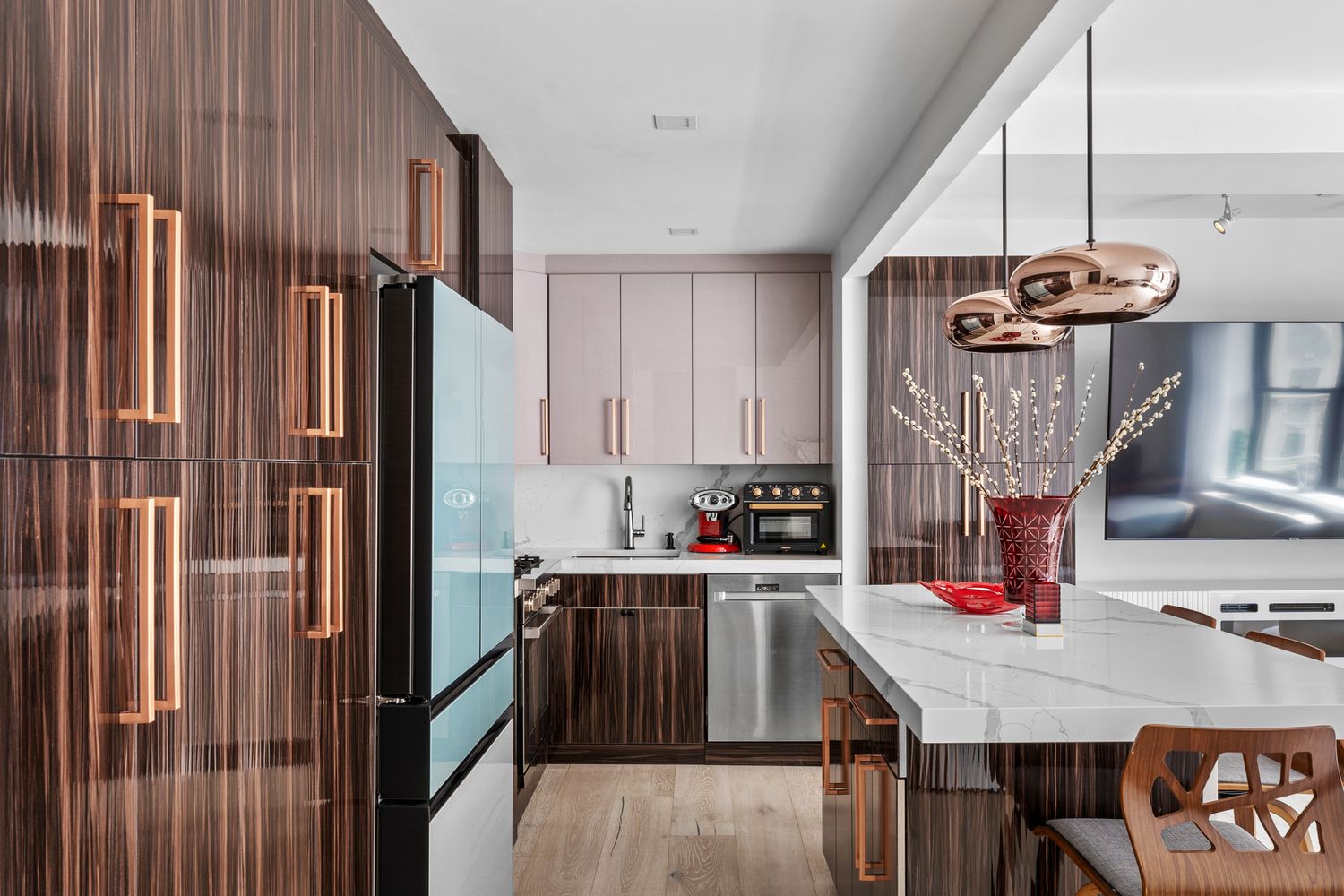 201 West 74th Street, Unit G8 Manhattan, NY 10023 - Photo 2 of 12 a kitchen with stainless steel appliances granite countertop a sink dishwasher and refrigerator with wooden floor