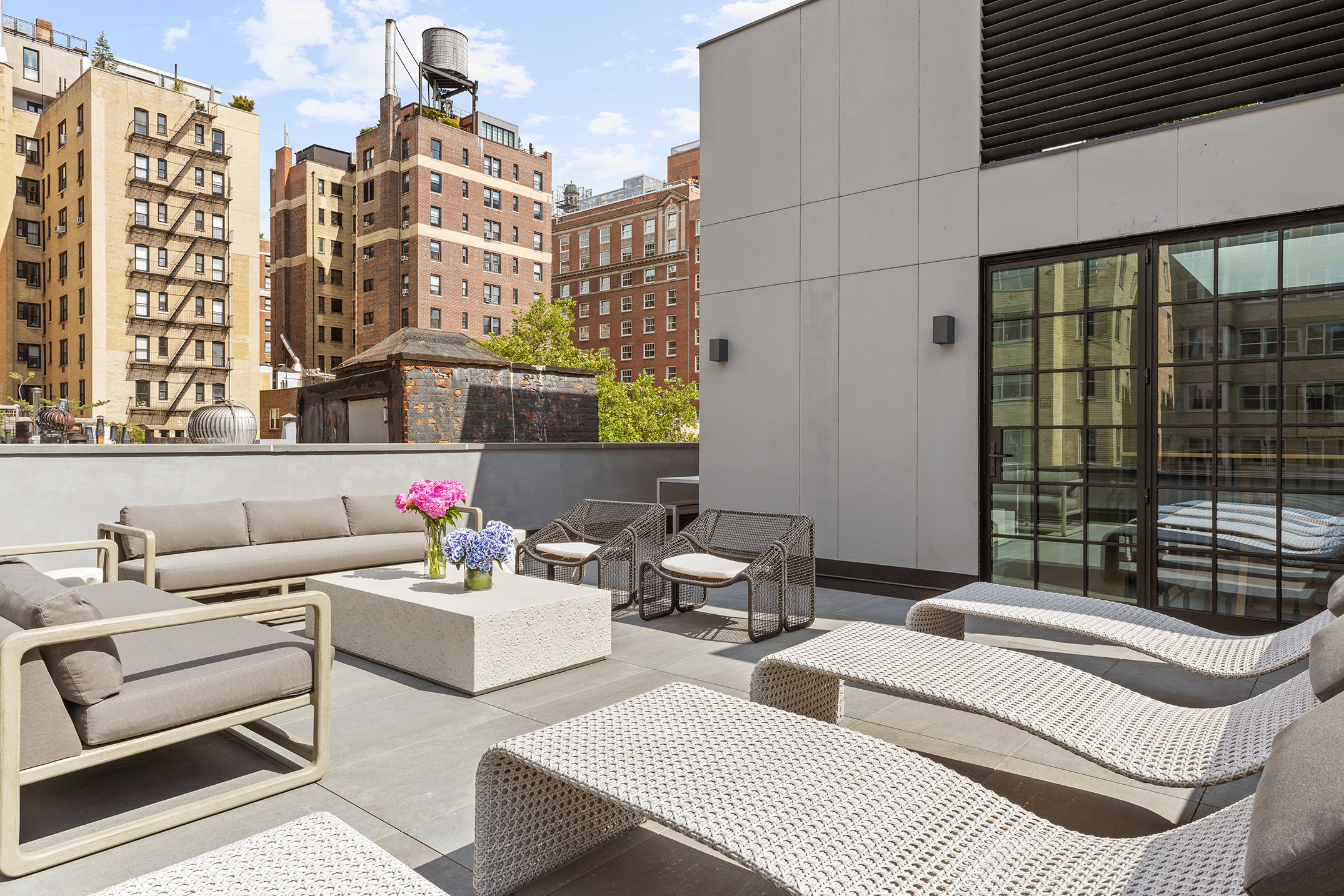 17 East 9th Street Manhattan, NY 10003 - Photo 29 of 32 a bathroom with a couch and a window