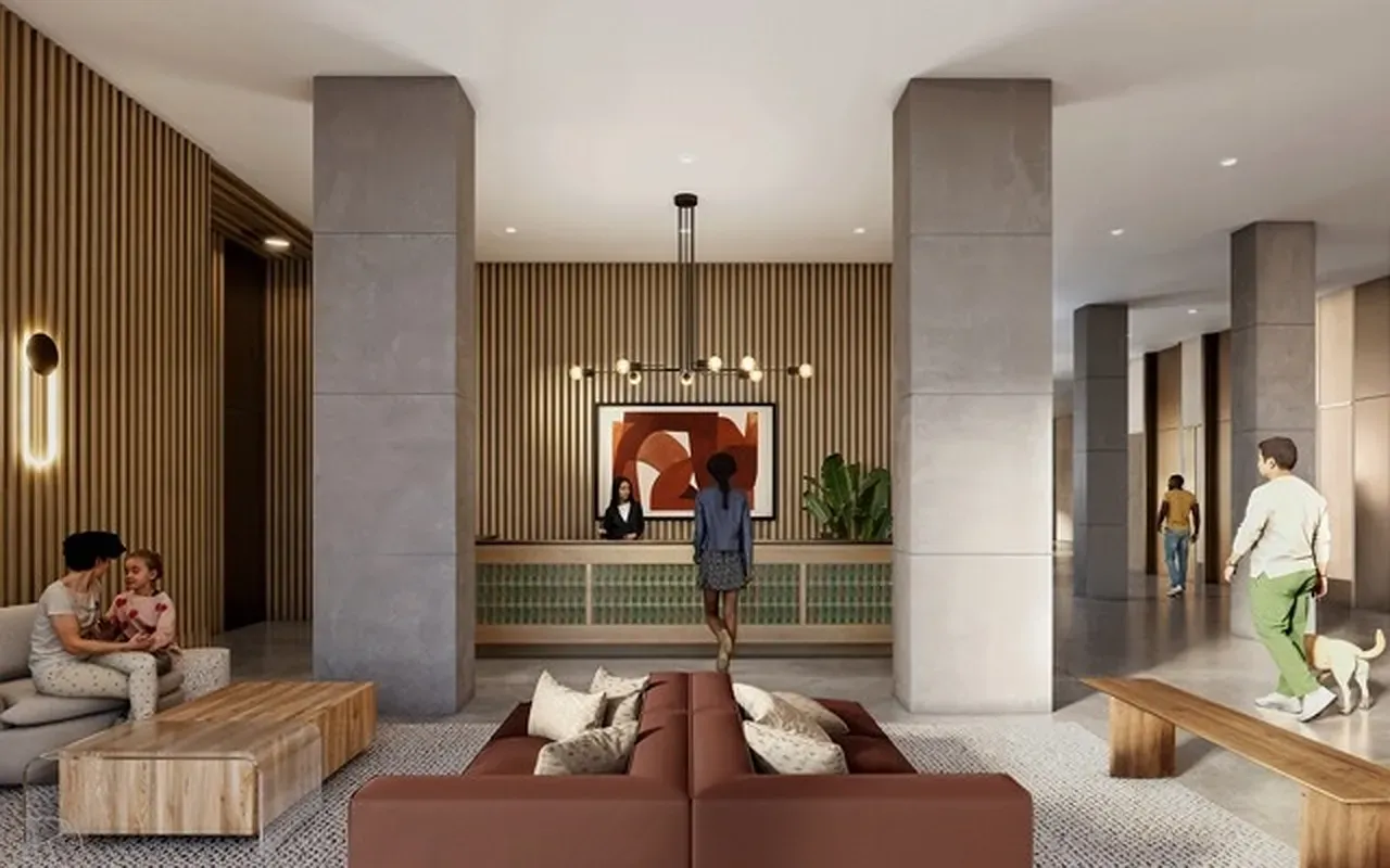 a living room with furniture and a chandelier