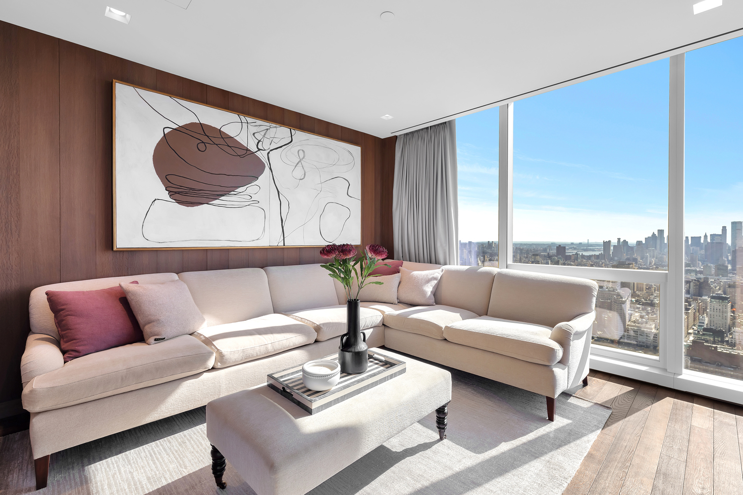 23 East 22nd Street, Unit PH Manhattan, NY 10010 - Photo 17 of 32 a living room with furniture and a large window