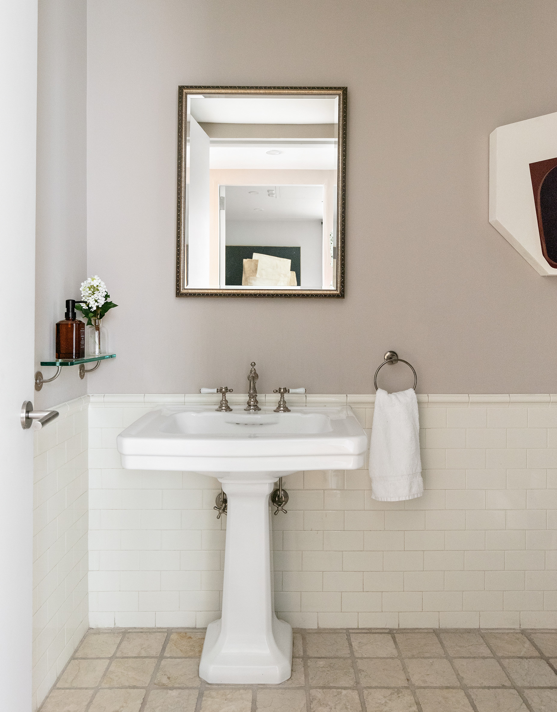 76 Crosby Street, Unit 2A Manhattan, NY 10012 - Photo 11 of 12 a bathroom with a sink and a mirror