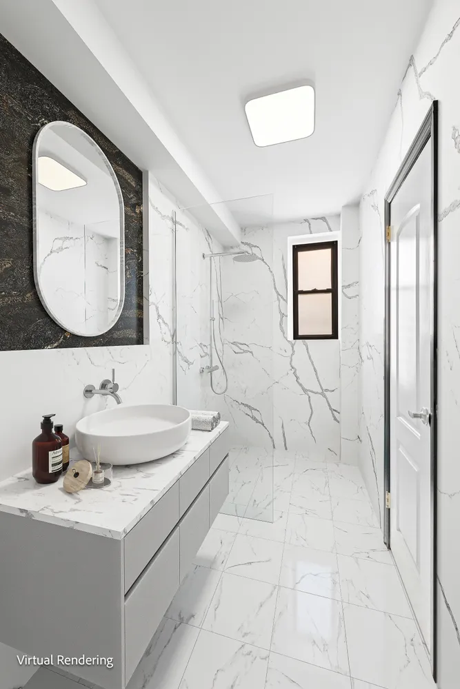 a view of an empty room with a fireplace