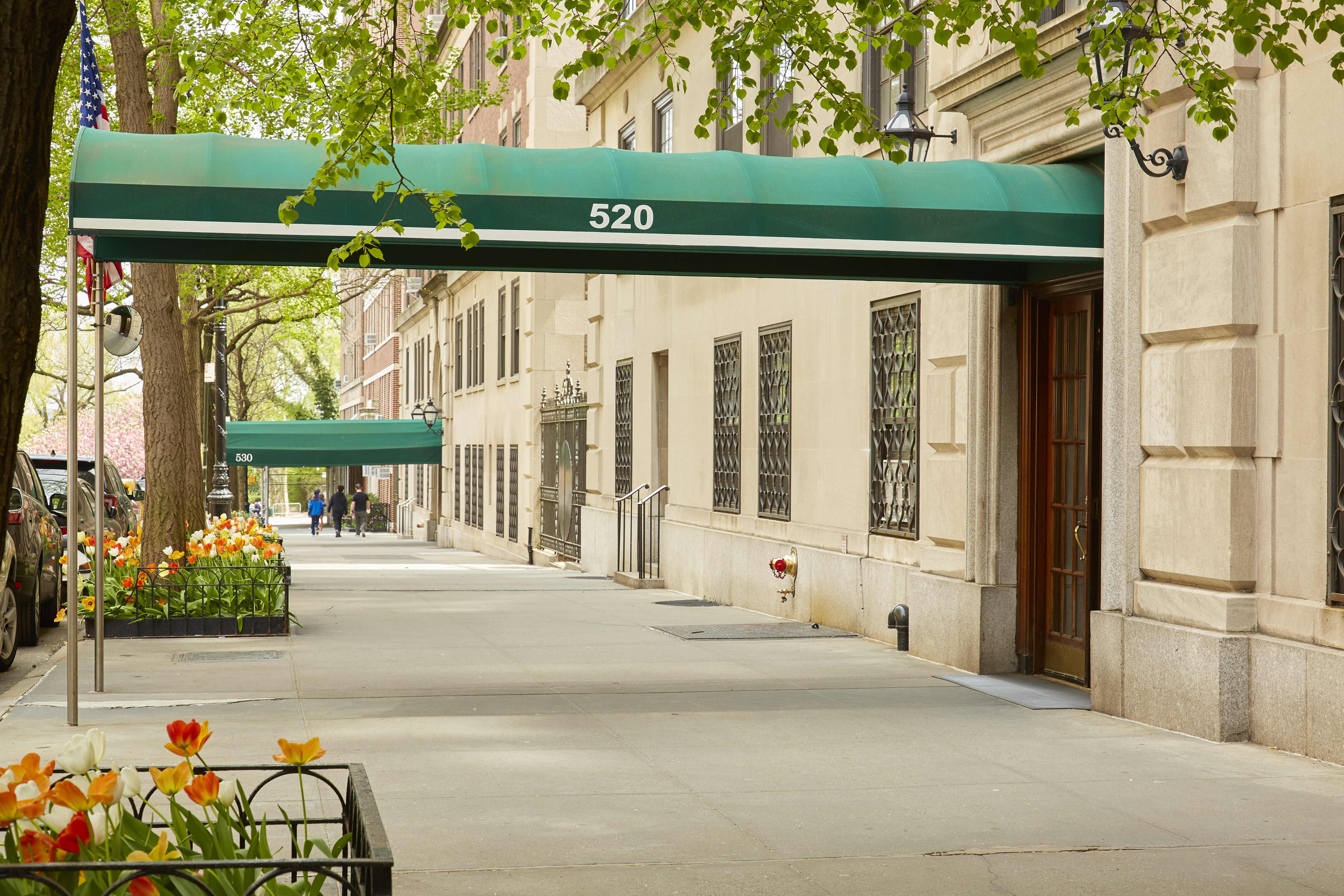 520 East 86th Street, Unit 2D Manhattan, NY 10028 - Photo 13 of 15 a front view of a house with a garage