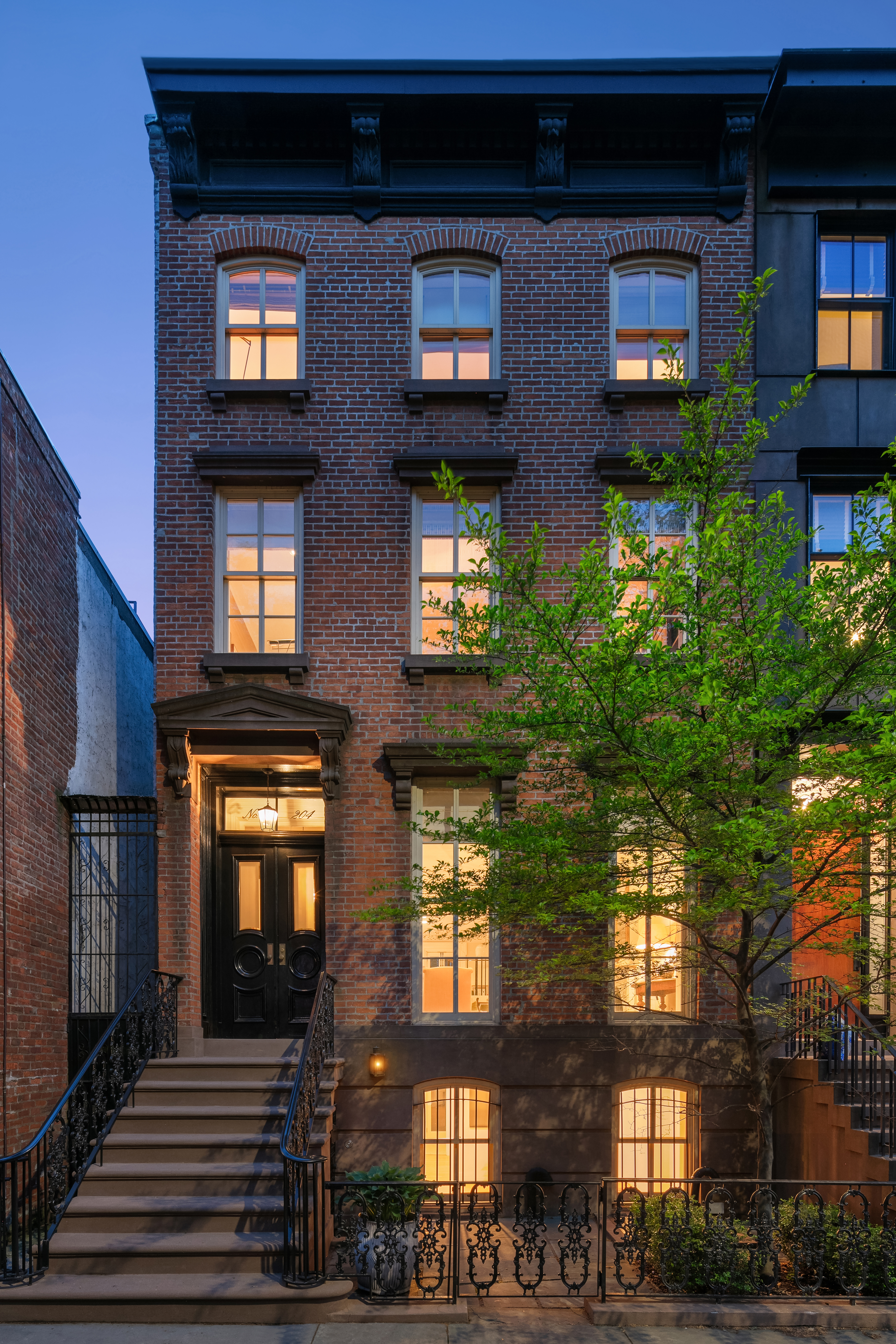 204 Warren Street Brooklyn, NY 11201 - Photo 26 of 29 a view of a building with many windows