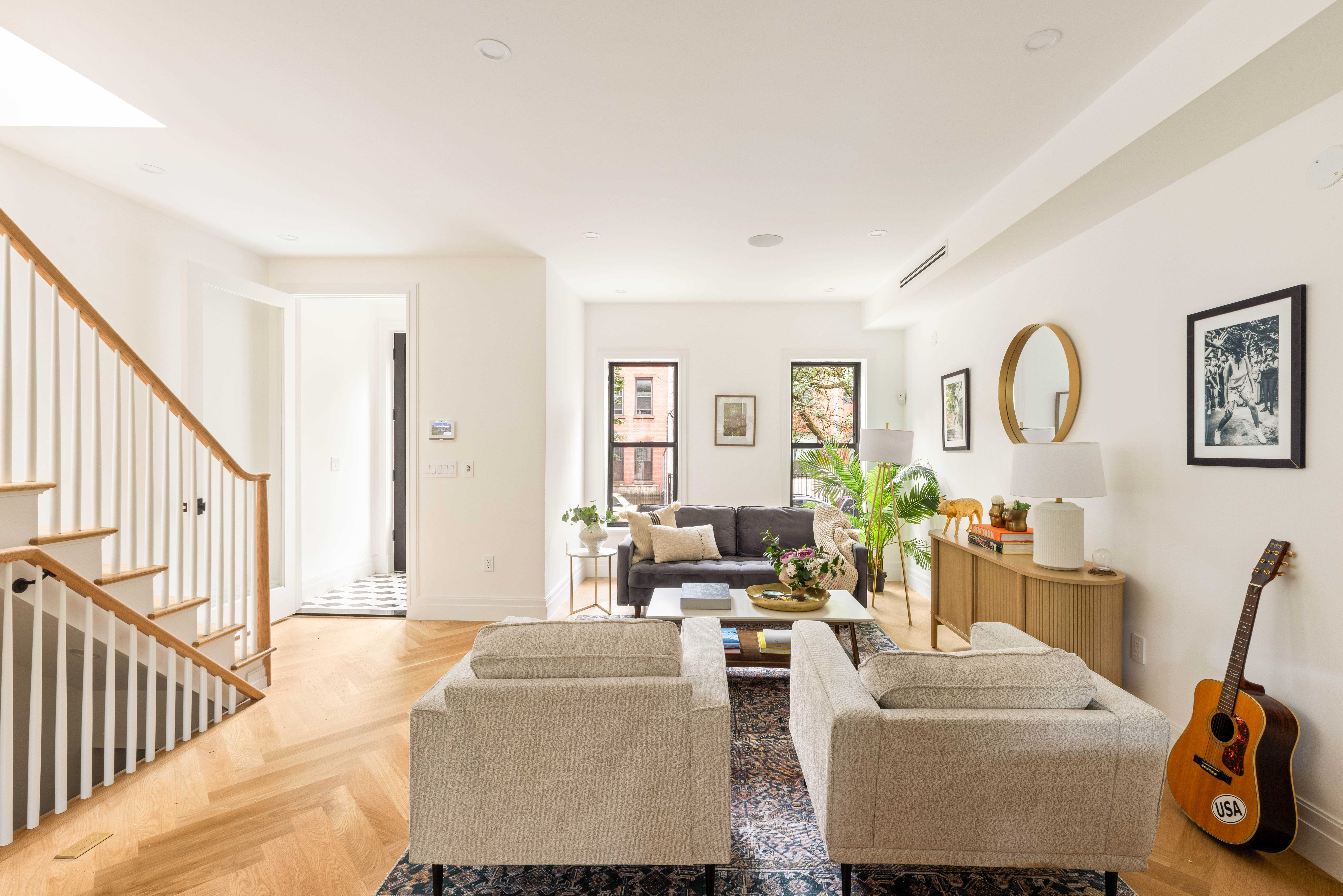 a living room with furniture and a window