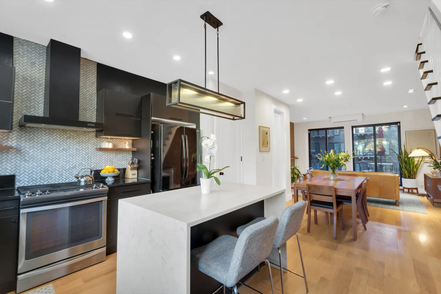 a kitchen with a table and chairs