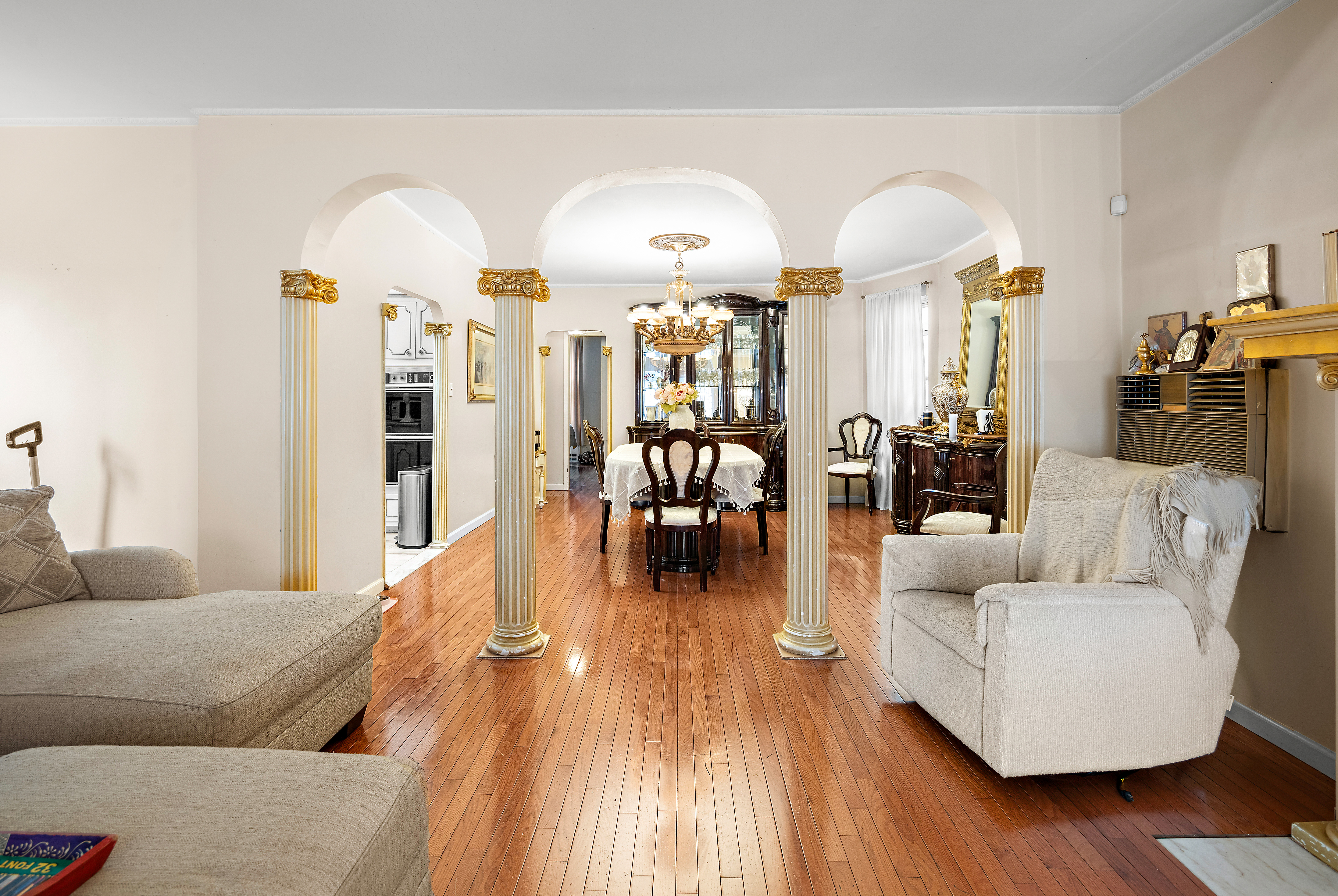 562 84th Street Brooklyn, NY 11209 - Photo 4 of 25 a living room with furniture and wooden floor