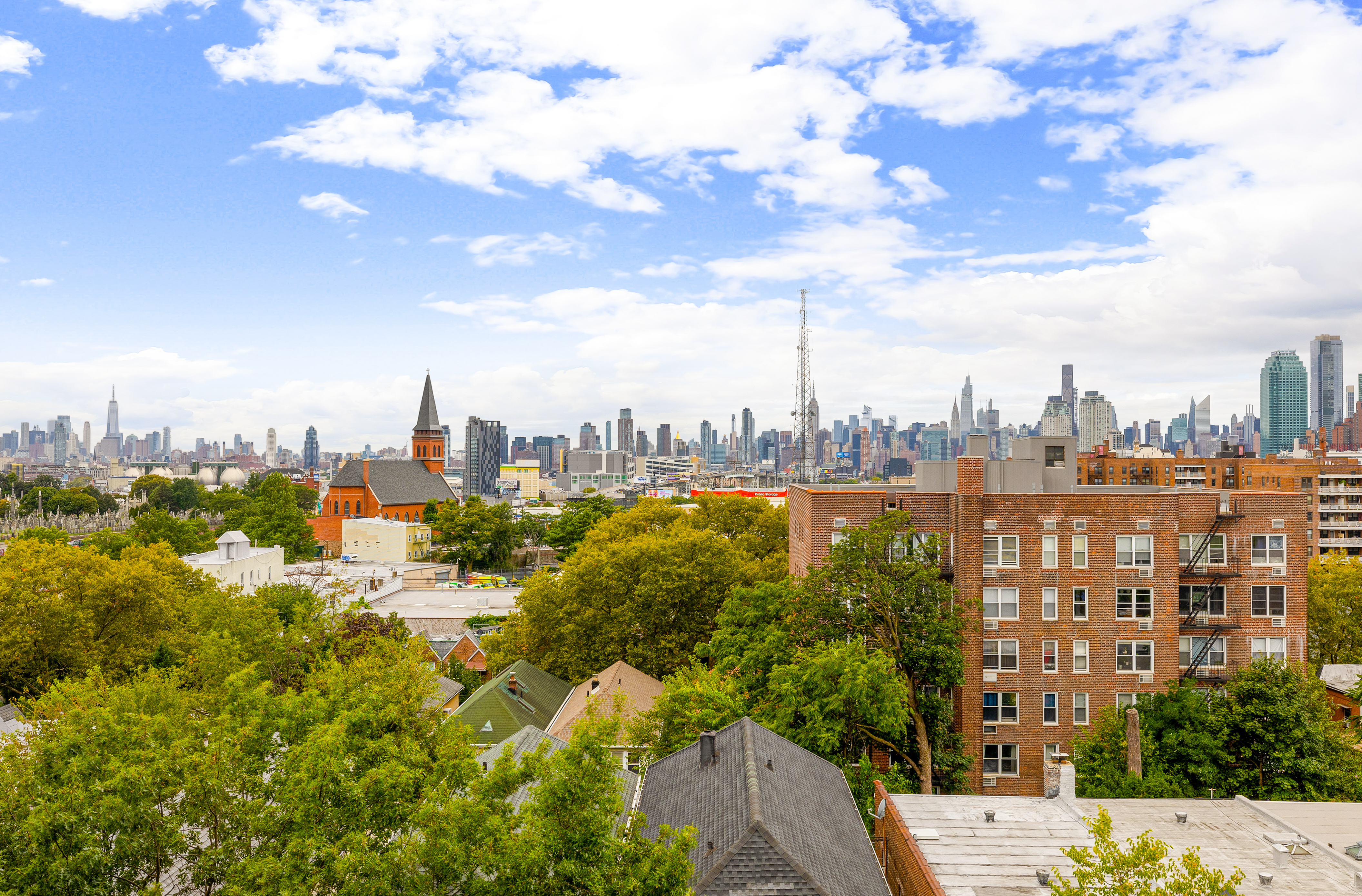 50-21 39th Place, Unit 6D Queens, NY 11104 - Photo 4 of 15 a view of a city with tall buildings