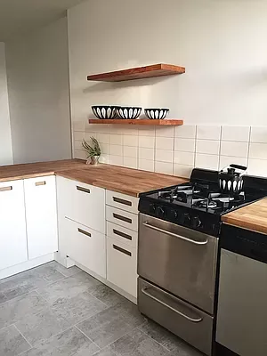 a kitchen with a stove and a sink