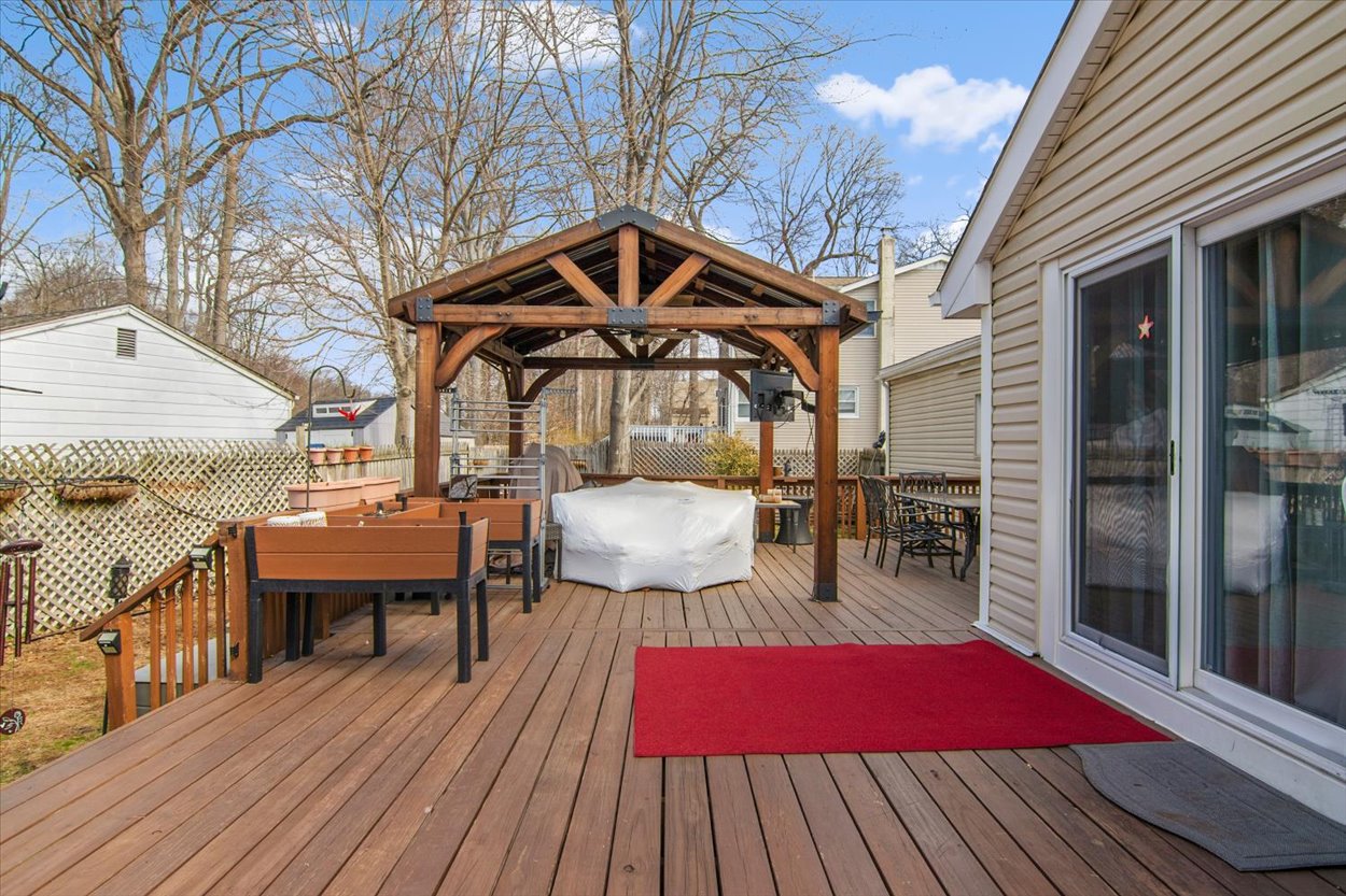 107 Kingston Road Parsippany, NJ 07054 - Photo 26 of 43 a view of a rooftop deck with couch and chairs