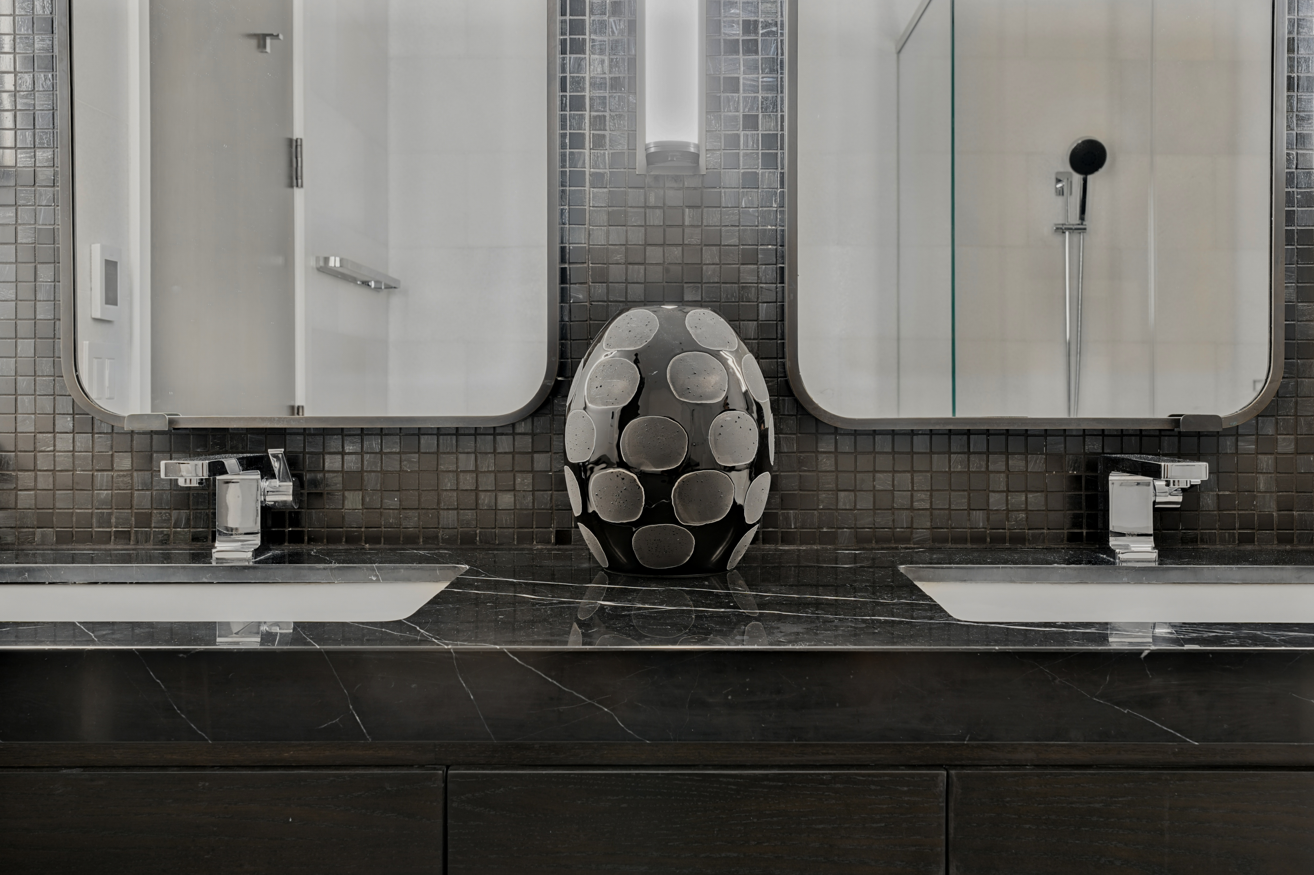 172 Madison Avenue, Unit 24B Manhattan, NY 10016 - Photo 9 of 16 a bathroom with a sink and a mirror