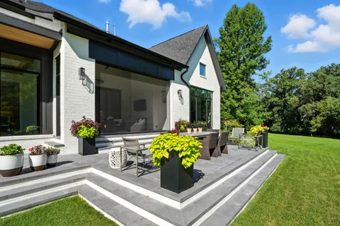 a view of a livingroom with furniture and a window