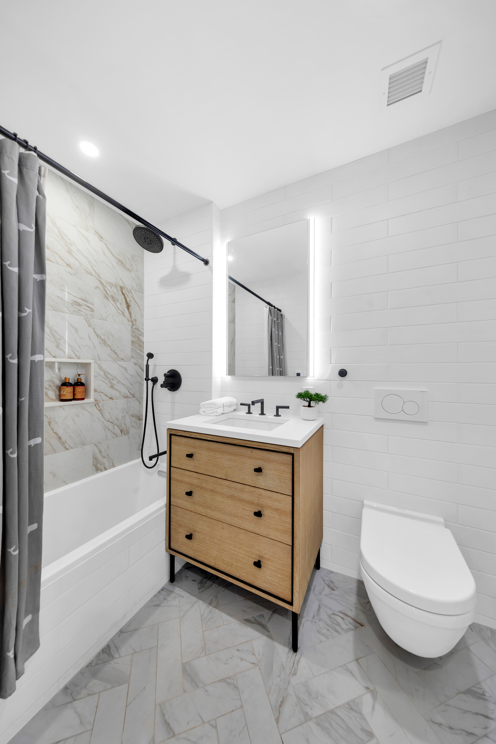 532 Clinton Avenue, Unit 5A Brooklyn, NY 11238 - Photo 10 of 11 a bathroom with a sink a toilet and bathtub