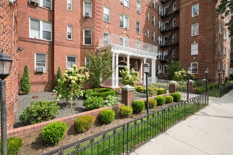 a view of a building with garden