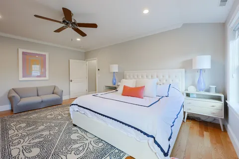 a bed room with a bed and a couch