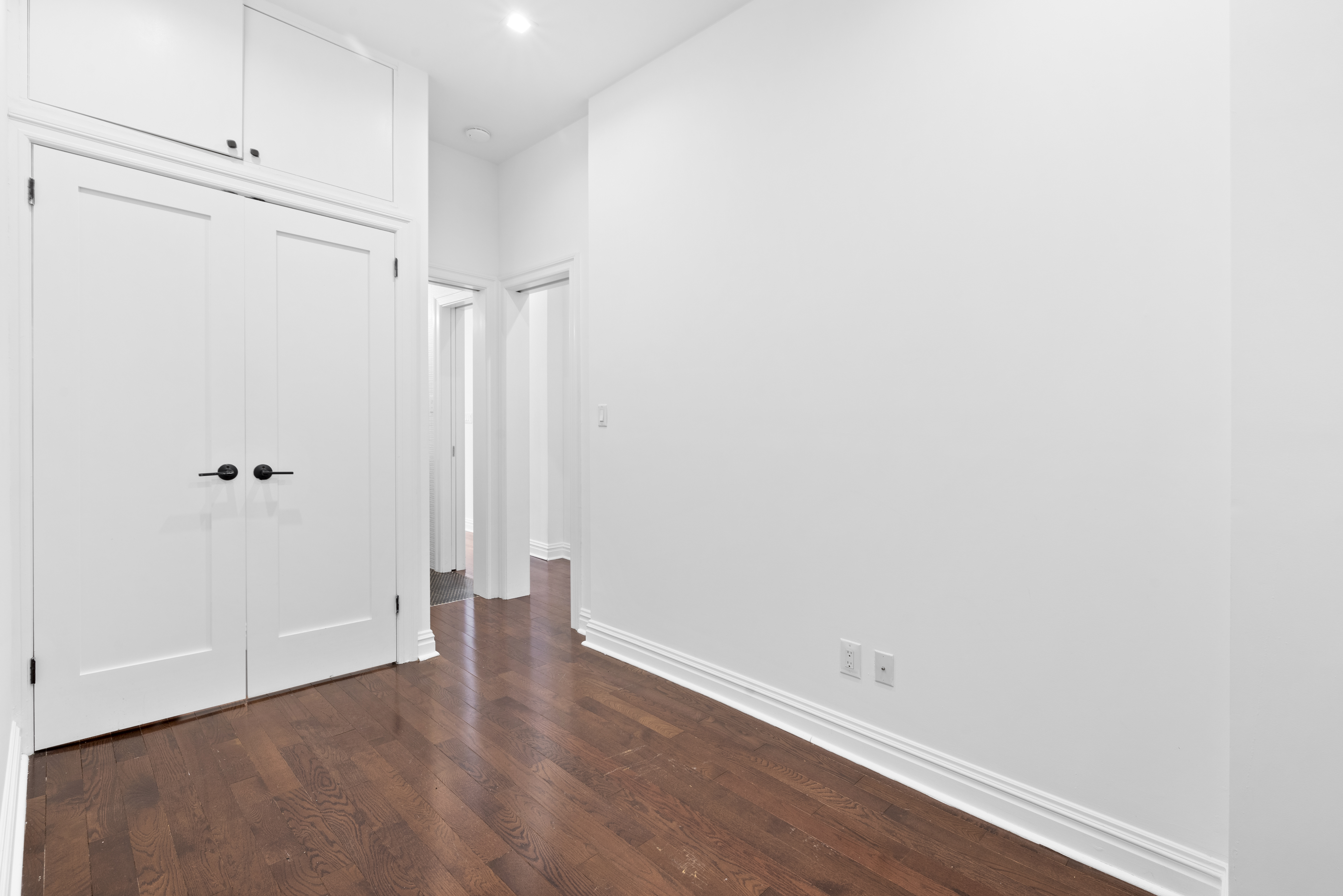31 St Marks Place, Unit 10 Manhattan, NY 10003 - Photo 5 of 8 a view of an empty room with wooden floor
