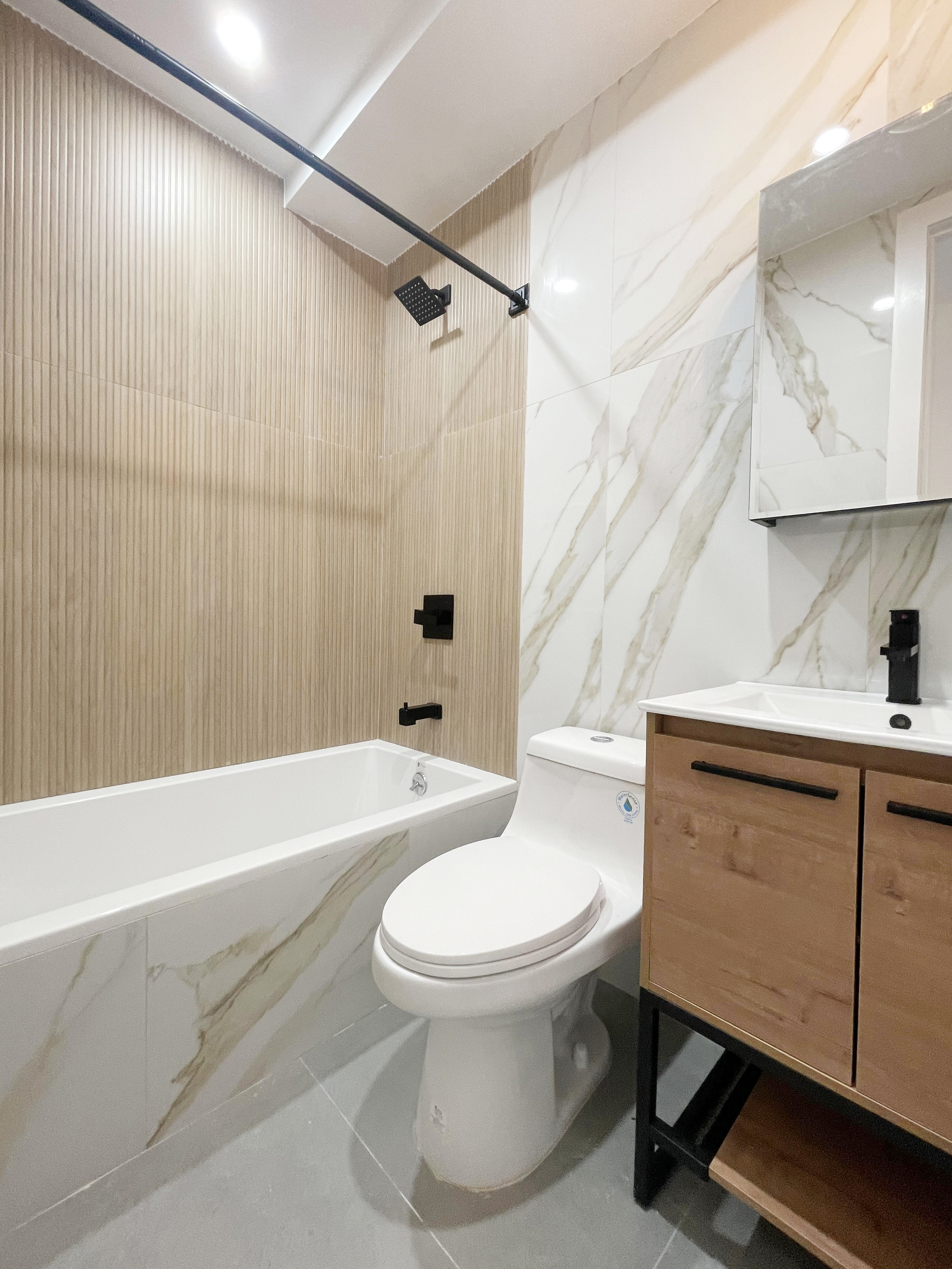 431 Columbia Street, Unit PH Brooklyn, NY 11231 - Photo 6 of 7 a bathroom with a sink toilet and shower