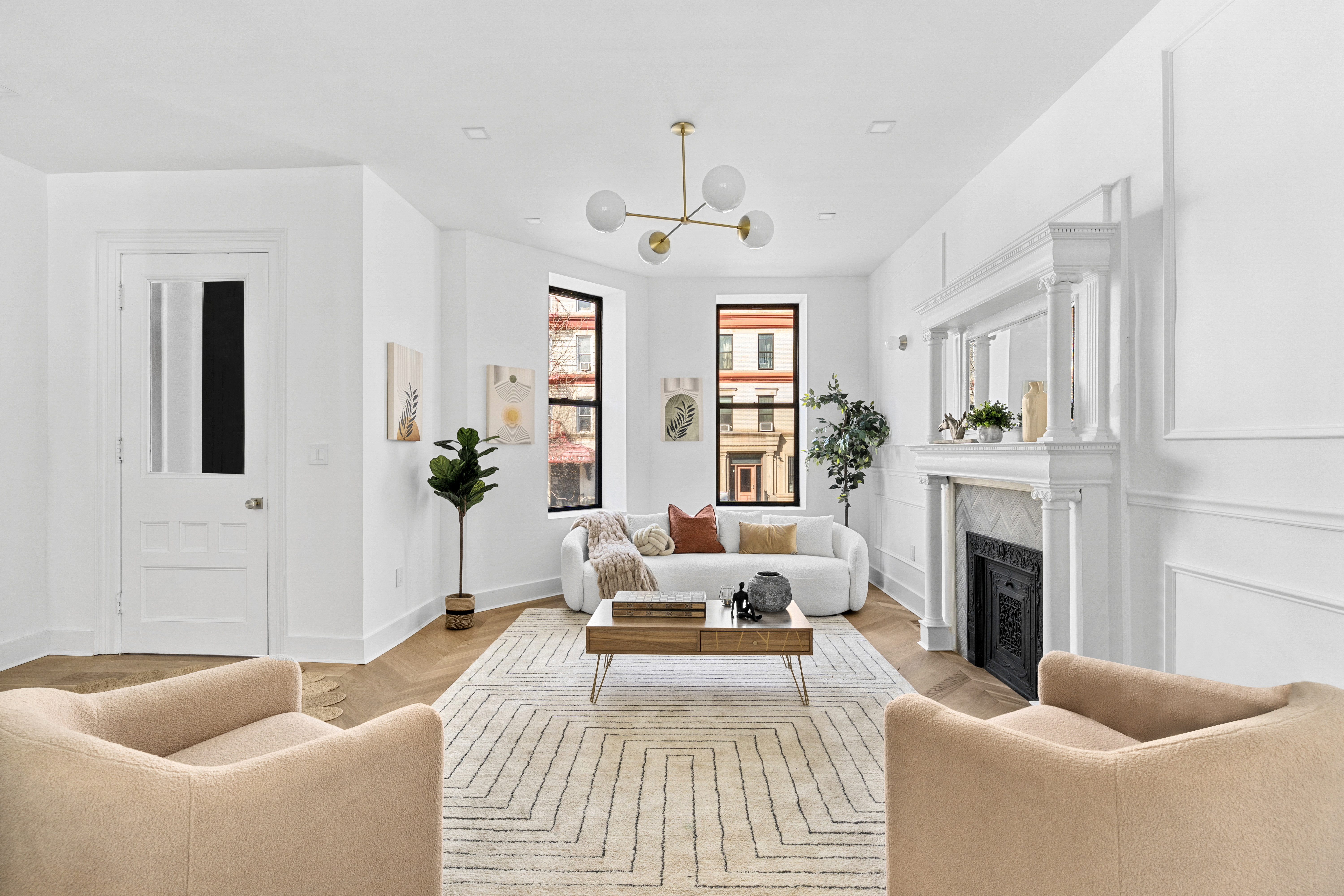 718 Sterling Place Brooklyn, NY 11216 - Photo 8 of 15 a spacious bedroom with furniture and a fireplace