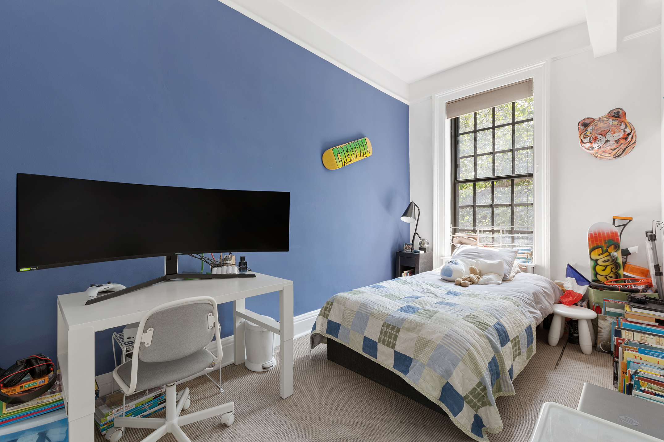 159 East 63rd Street, Unit 2/3 Manhattan, NY 10065 - Photo 10 of 13 a bedroom with a bed and a window