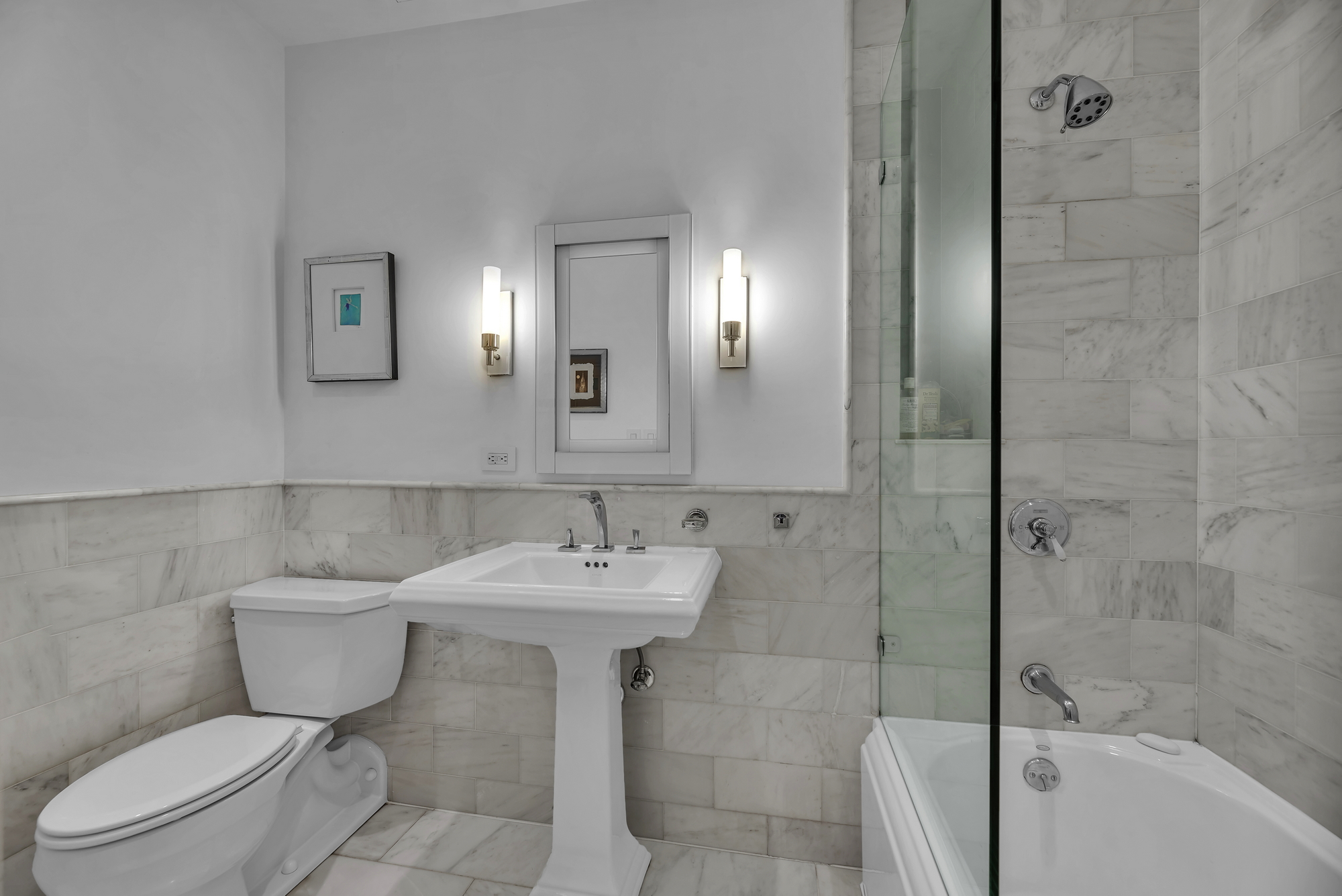 330 West End Avenue, Unit 2B Manhattan, NY 10023 - Photo 10 of 14 a bathroom with a sink toilet and shower