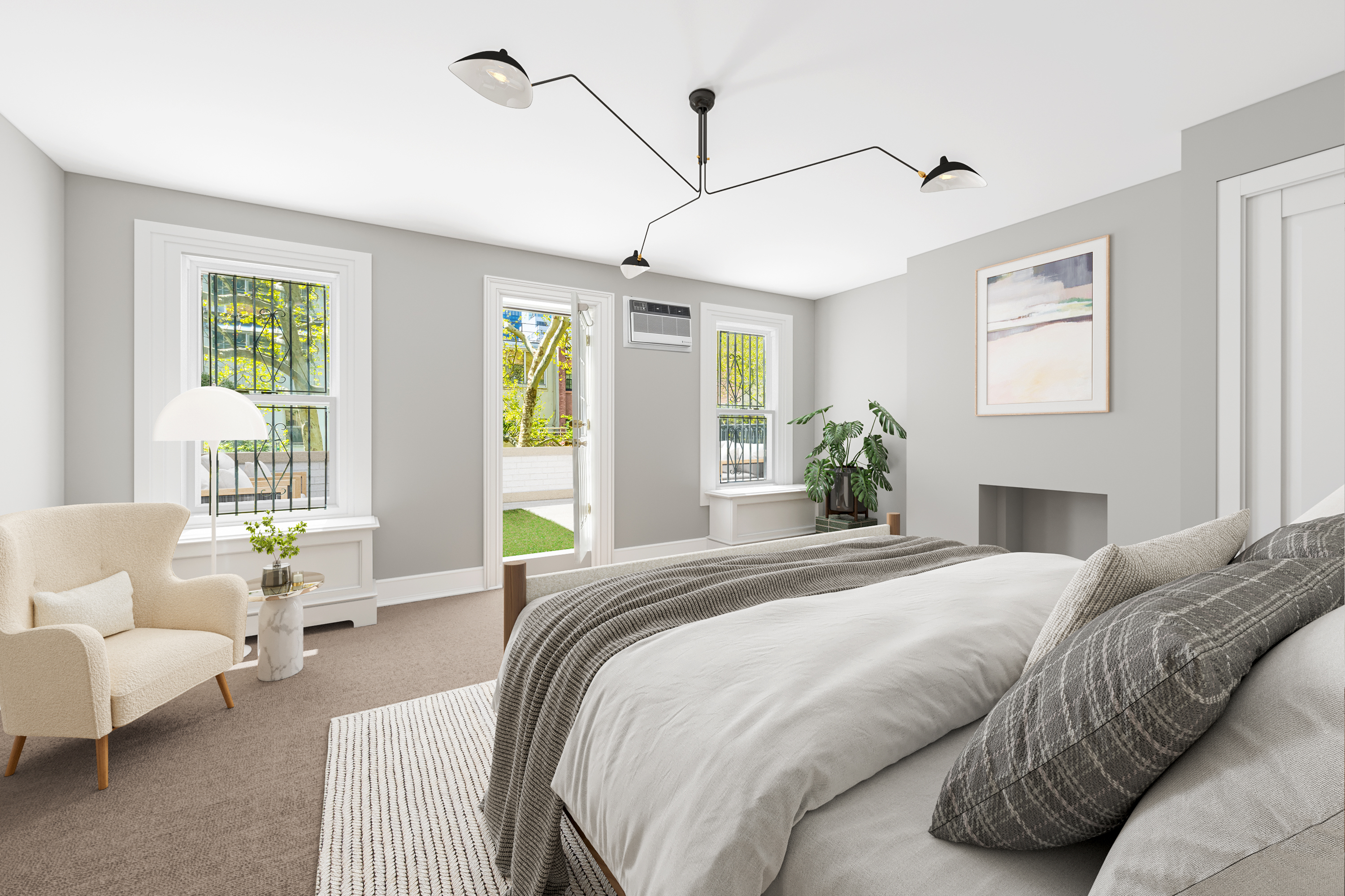 240 East 62nd Street Manhattan, NY 10065 - Photo 7 of 12 a spacious bedroom with a bed and a couch