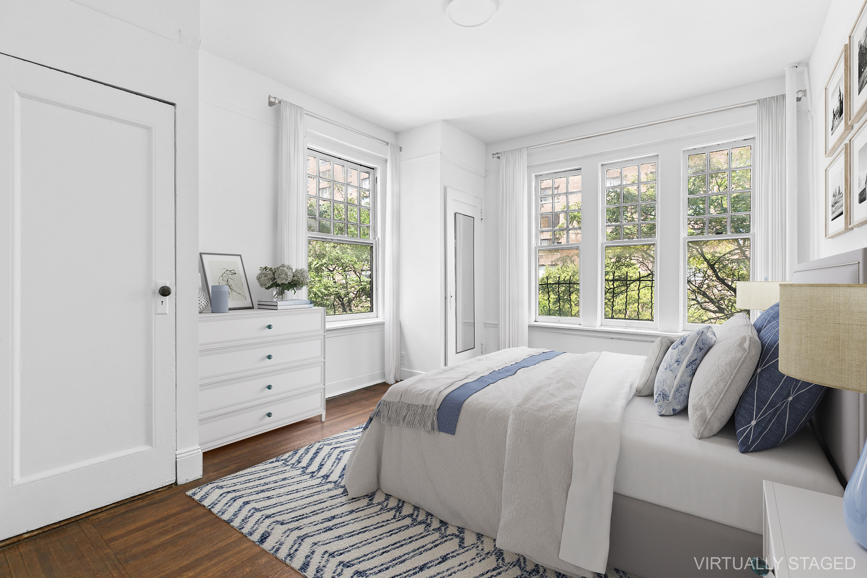 370 Central Park West, Unit 413 Manhattan, NY 10025 - Photo 5 of 19 a bedroom with a bed and a window