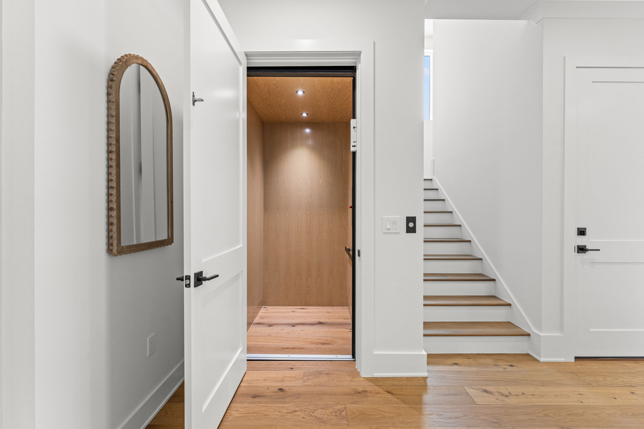 500 East Davis Boulevard Tampa, FL 33606 - Photo 17 of 36 a view of a hallway with wooden floor and staircase