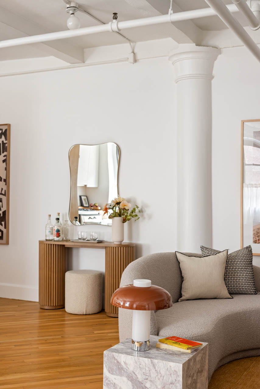 130 West 17th Street, Unit 5S Manhattan, NY 10011 - Photo 7 of 17 a living room with a couch and a table