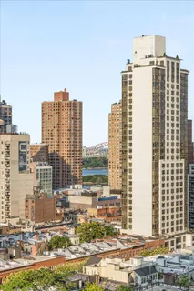 a view of a city with tall buildings