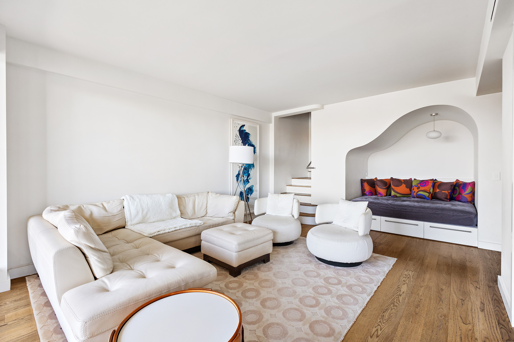 45 East End Avenue, Unit 6/7B Manhattan, NY 10028 - Photo 2 of 17 a living room with furniture and a wooden floor