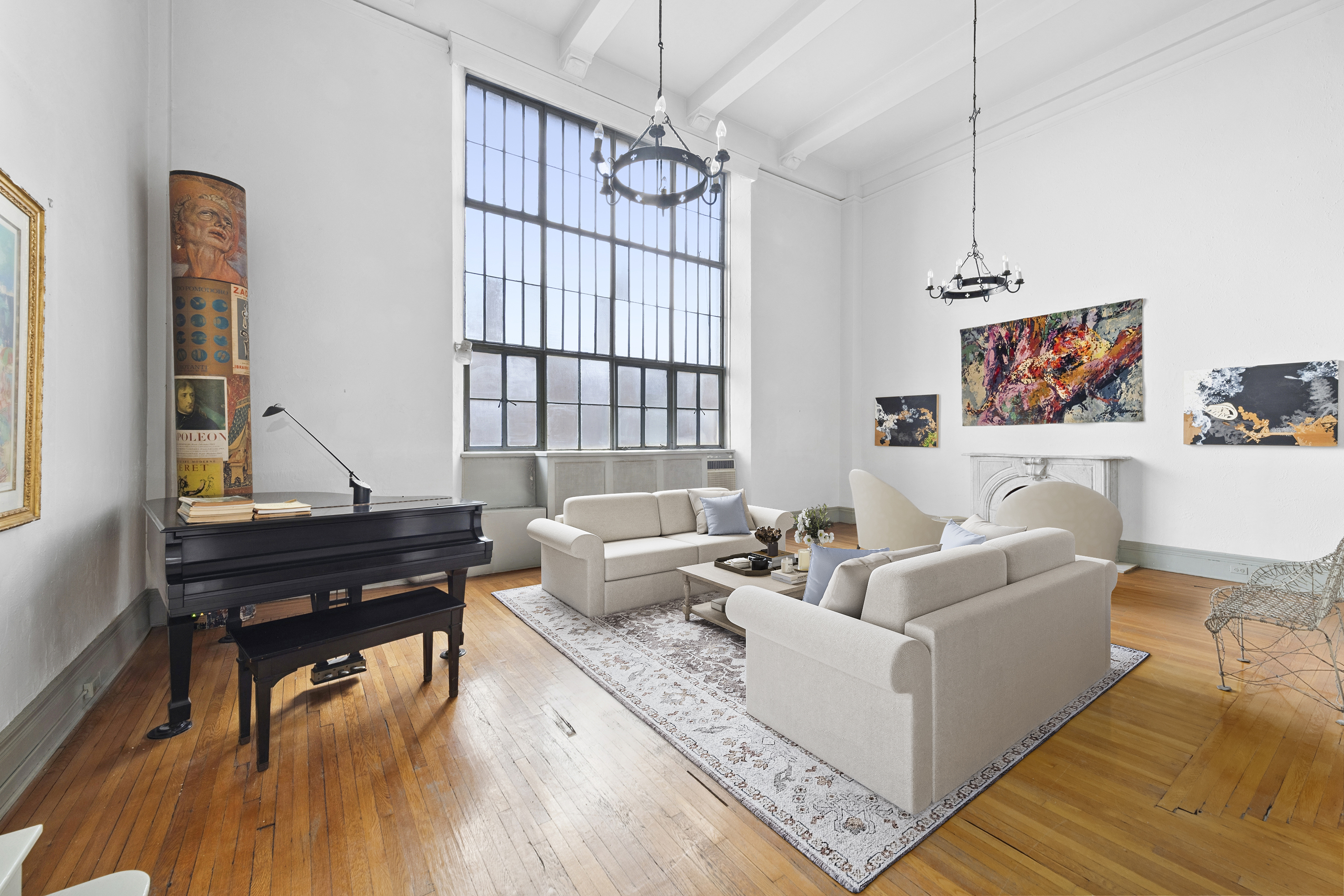 1 West 67th Street, Unit 303-304 Manhattan, NY 10023 - Photo 3 of 18 a living room with furniture and a wooden floor