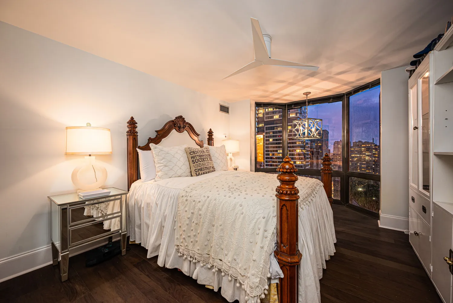 a bed room with a bed and a tv