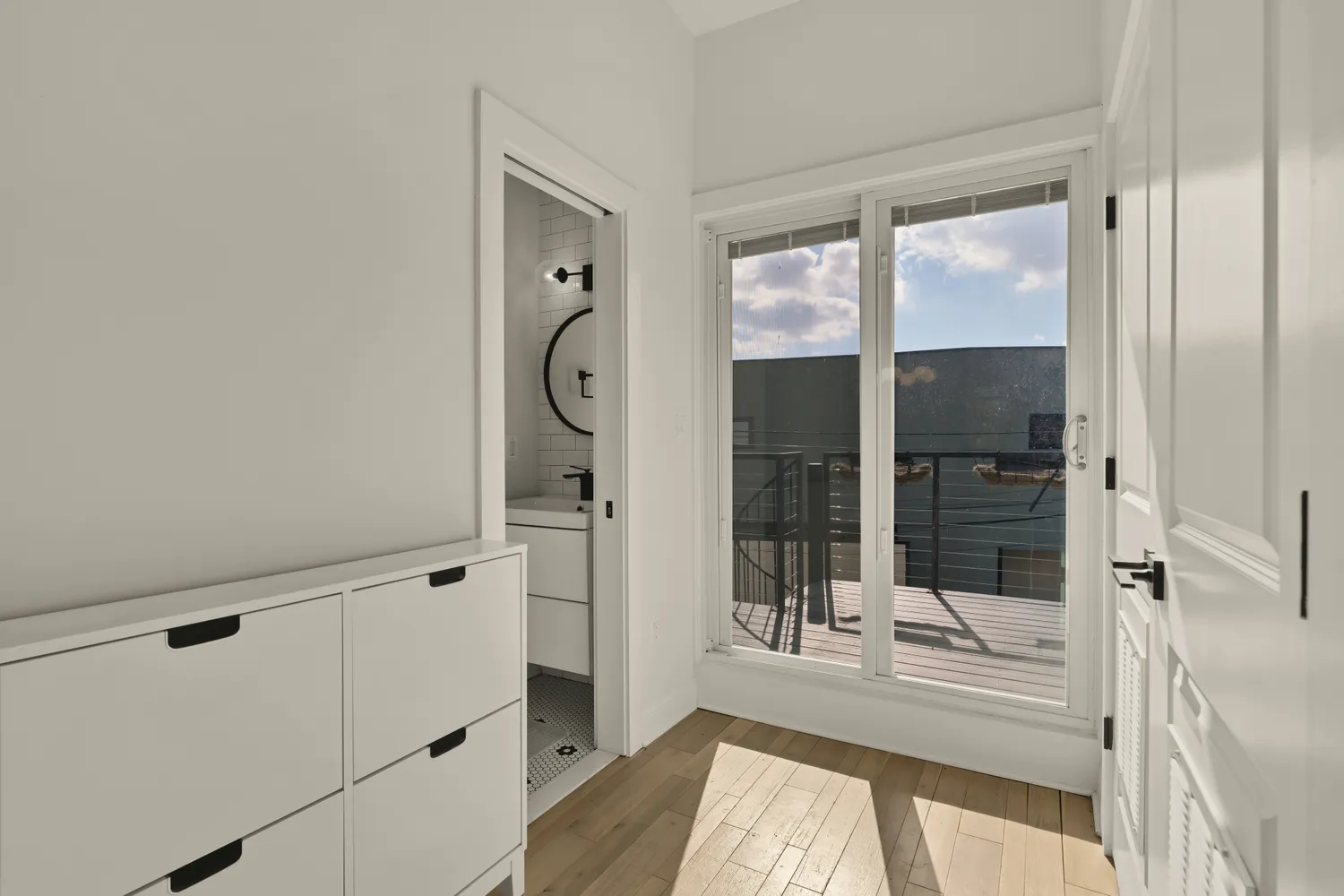 a view of a bathroom with a tub and shower